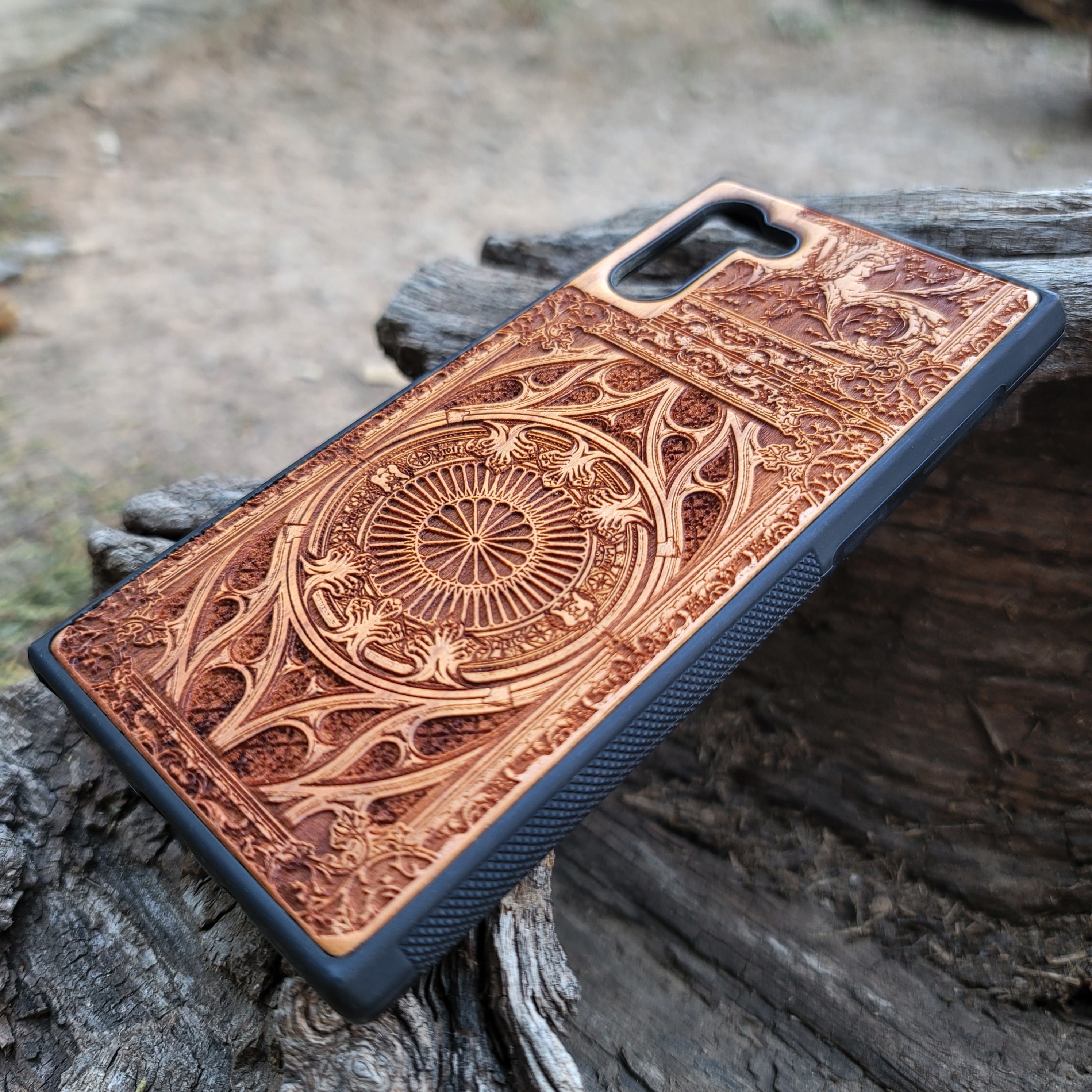 Wooden phone case with intricate gothic pattern, laser-engraved for iPhone , iPhone 15, Samsung Galaxy S, S24, Note 20. Durable and unique, perfect for gothic art fans and collectors.