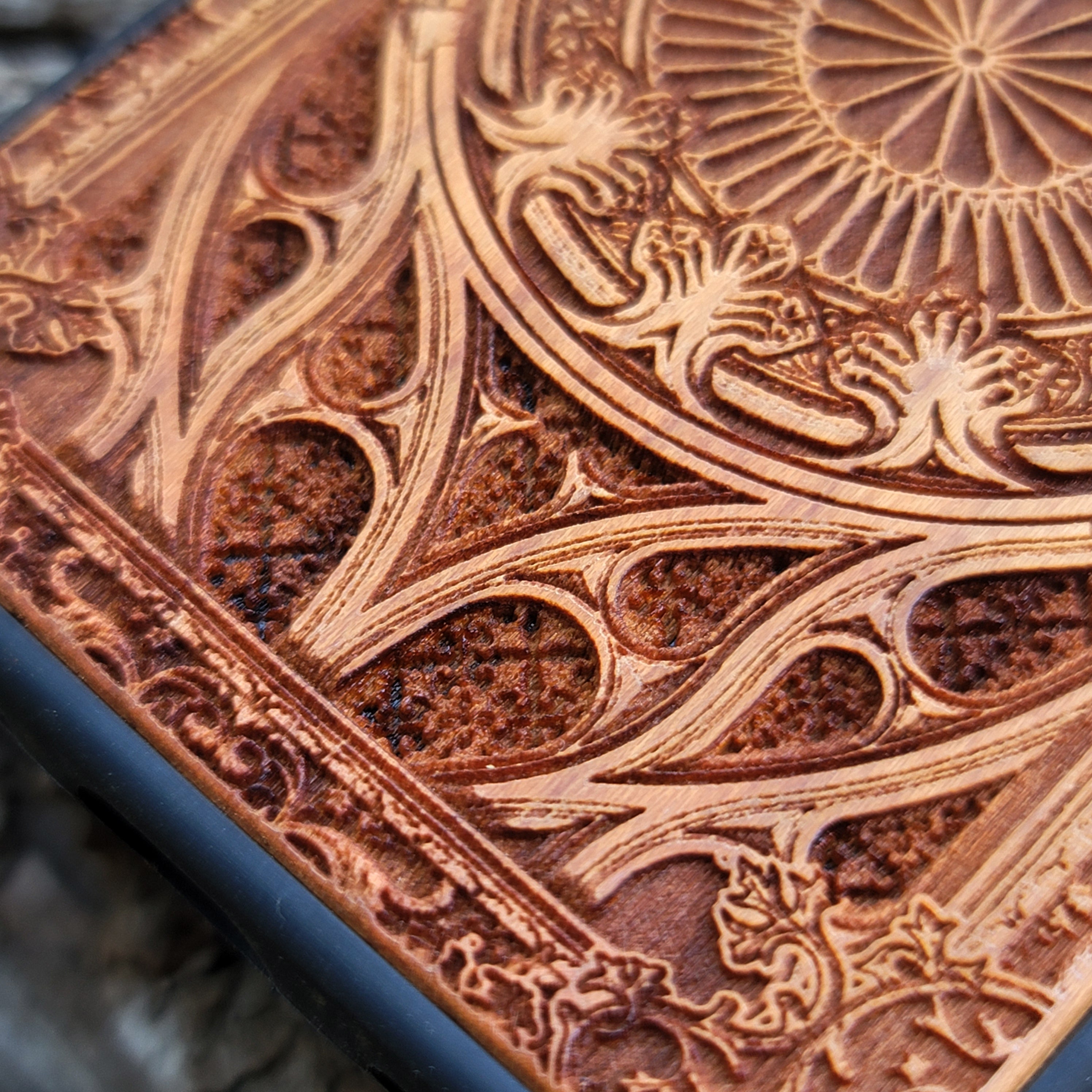 Wooden phone case with intricate gothic pattern, laser-engraved for iPhone , iPhone 15, Samsung Galaxy S, S24, Note 20. Durable and unique, perfect for gothic art fans and collectors.