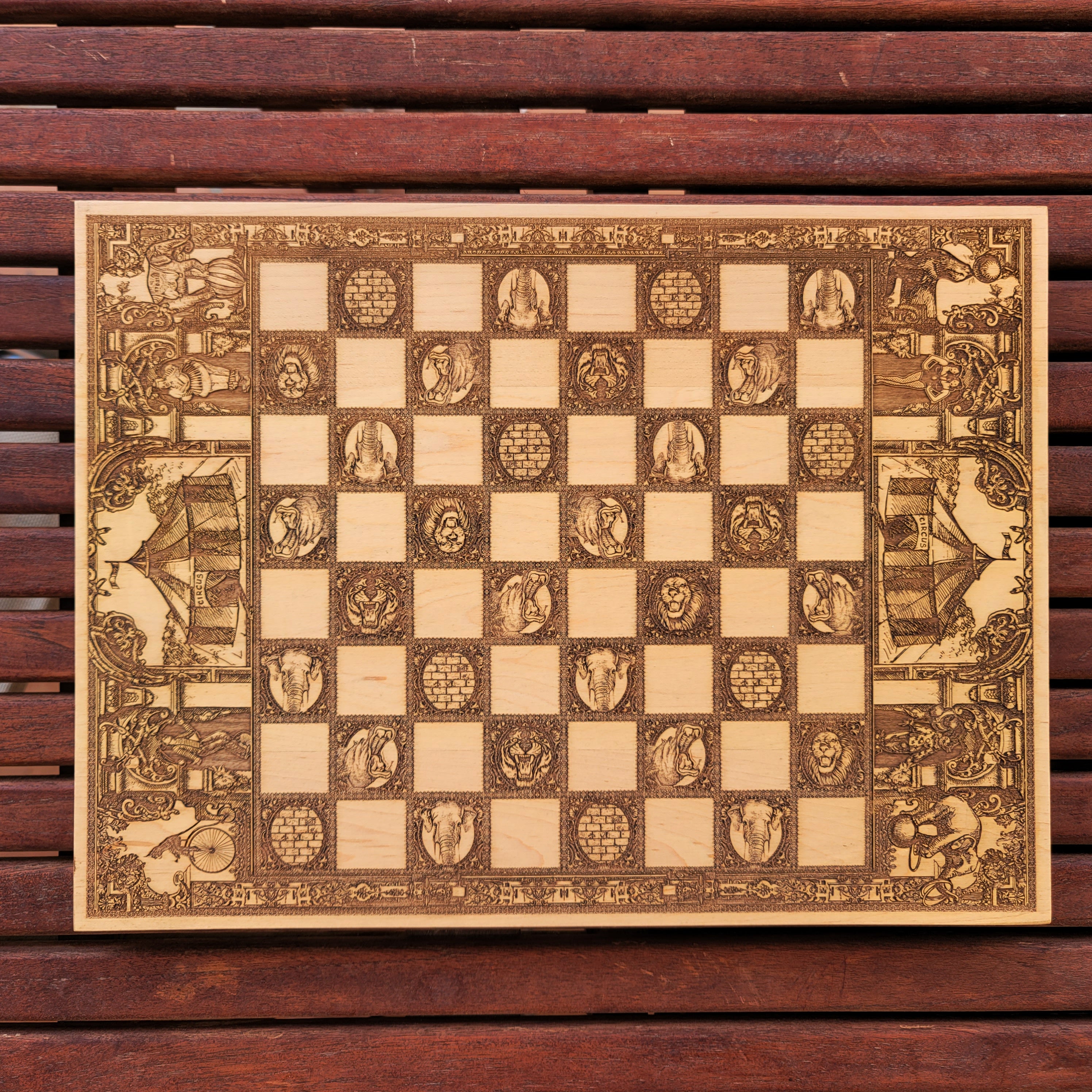 Close-up of intricate laser engravings on vintage circus-themed chessboard.
