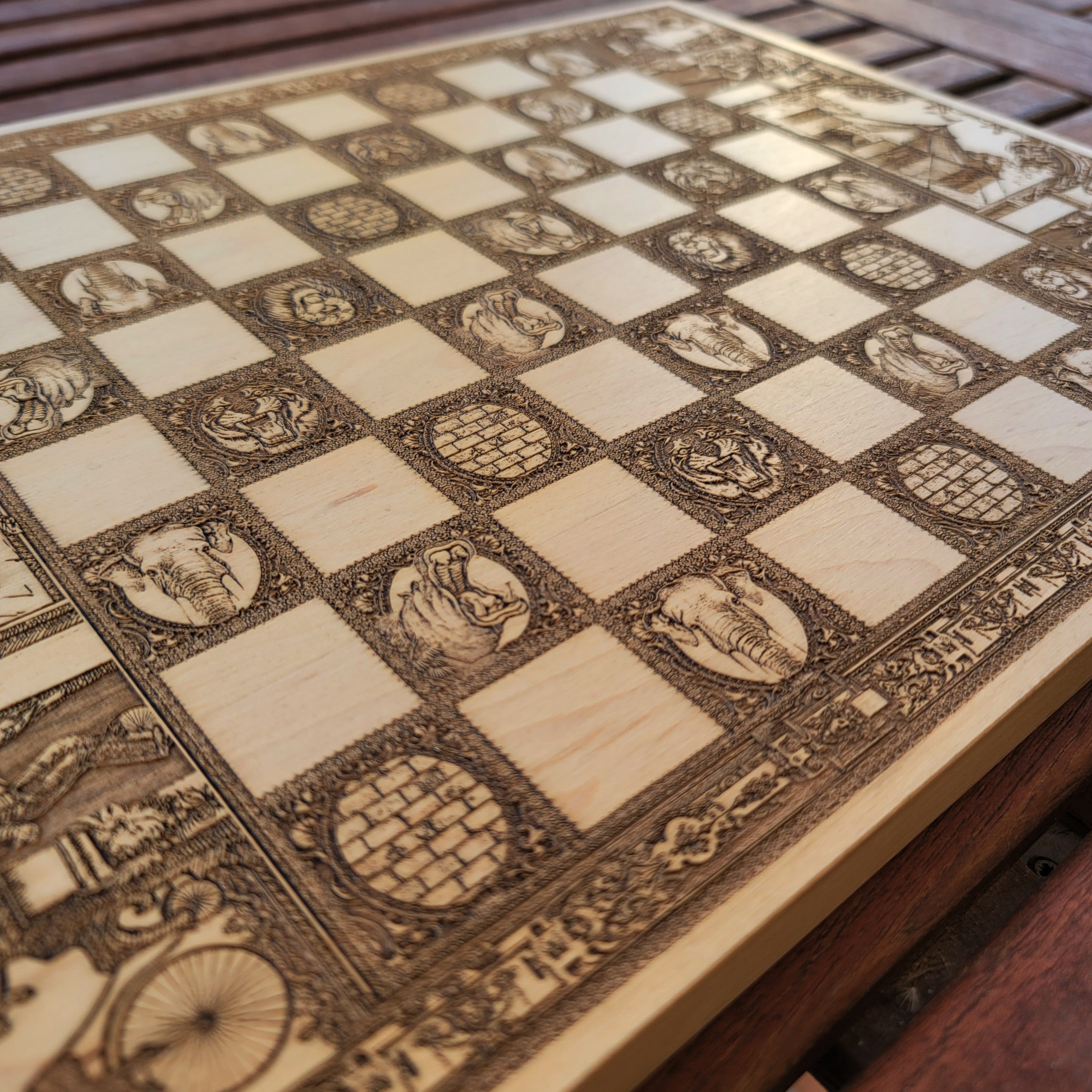 Artisan-crafted wooden chessboard with detailed vintage circus artwork, ideal for collectors.