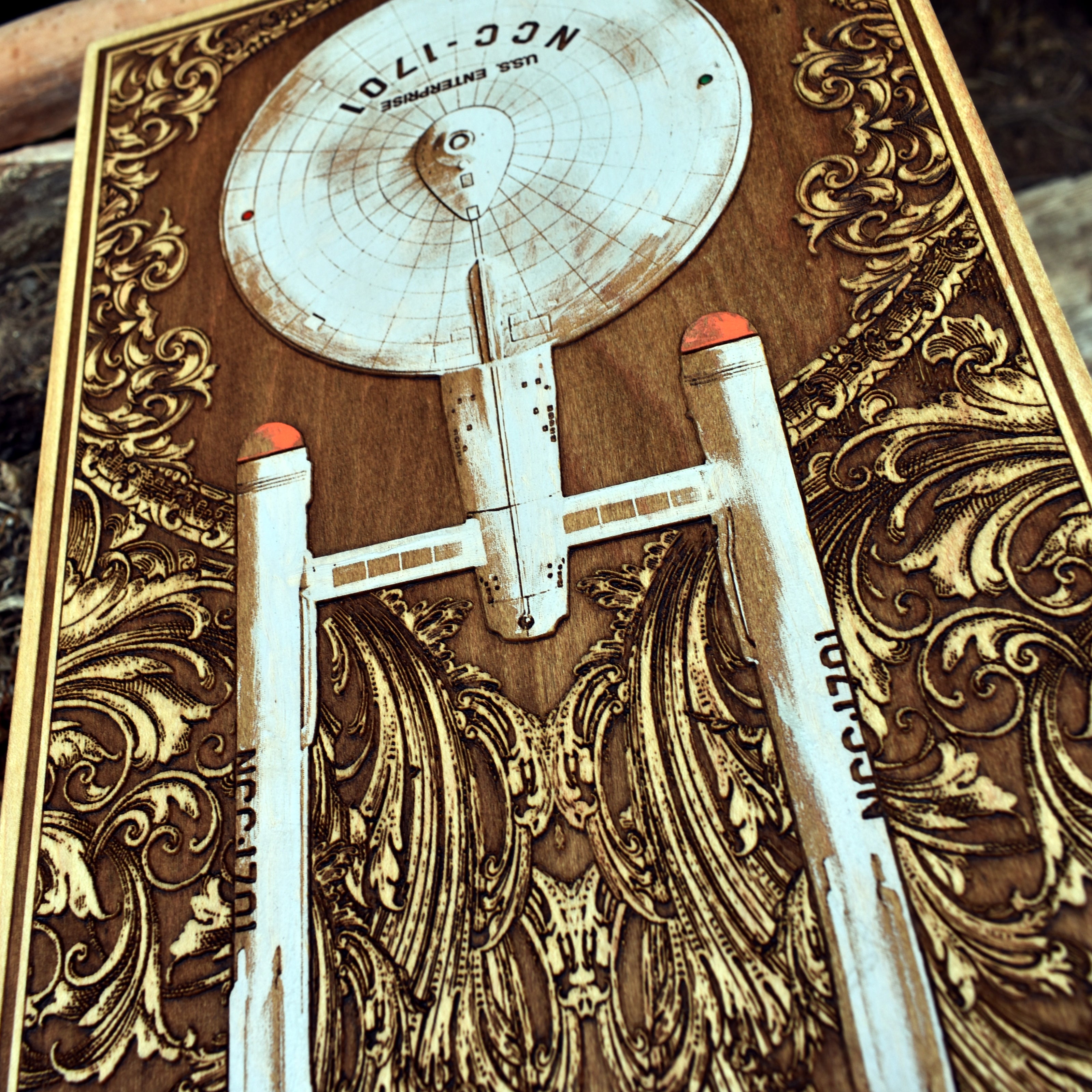 Enterprise-class starship wood artwork with deep engraving and sci-fi design.