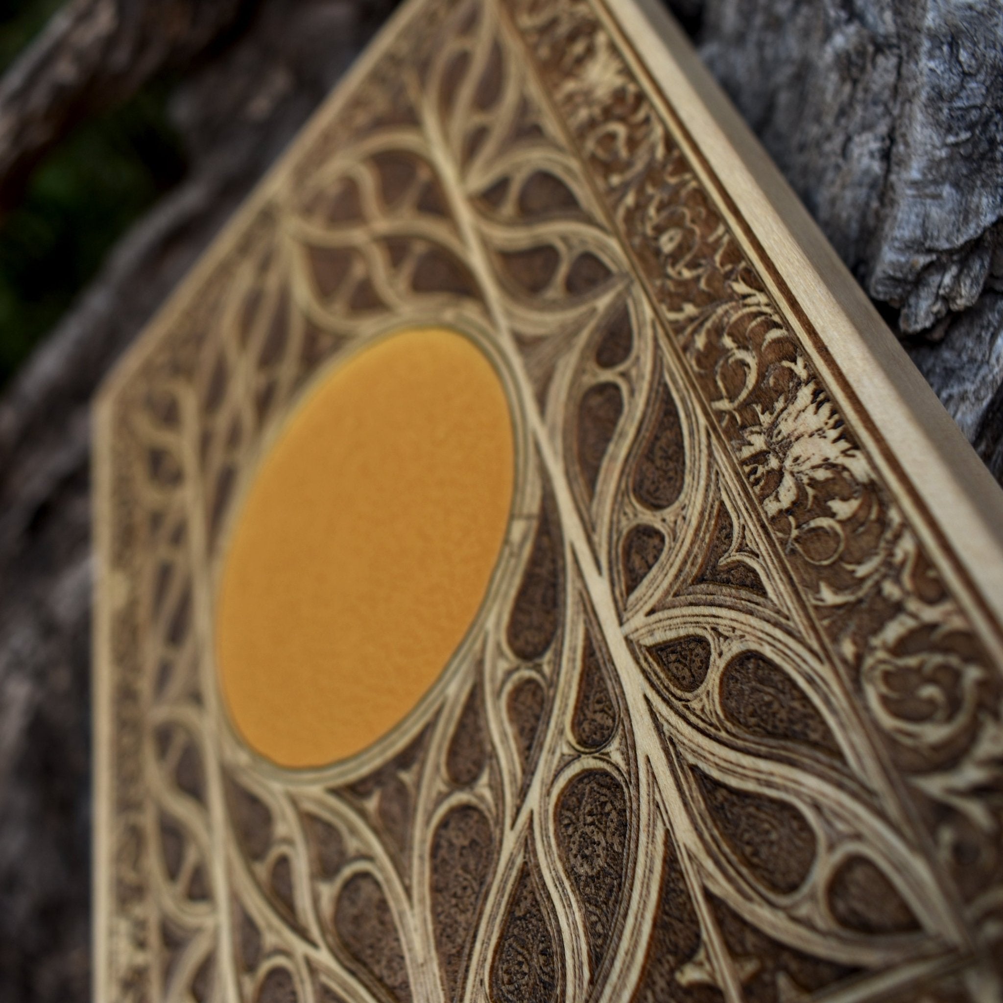 Custom wooden gothic window wall art, handcrafted with a personalized symbol.