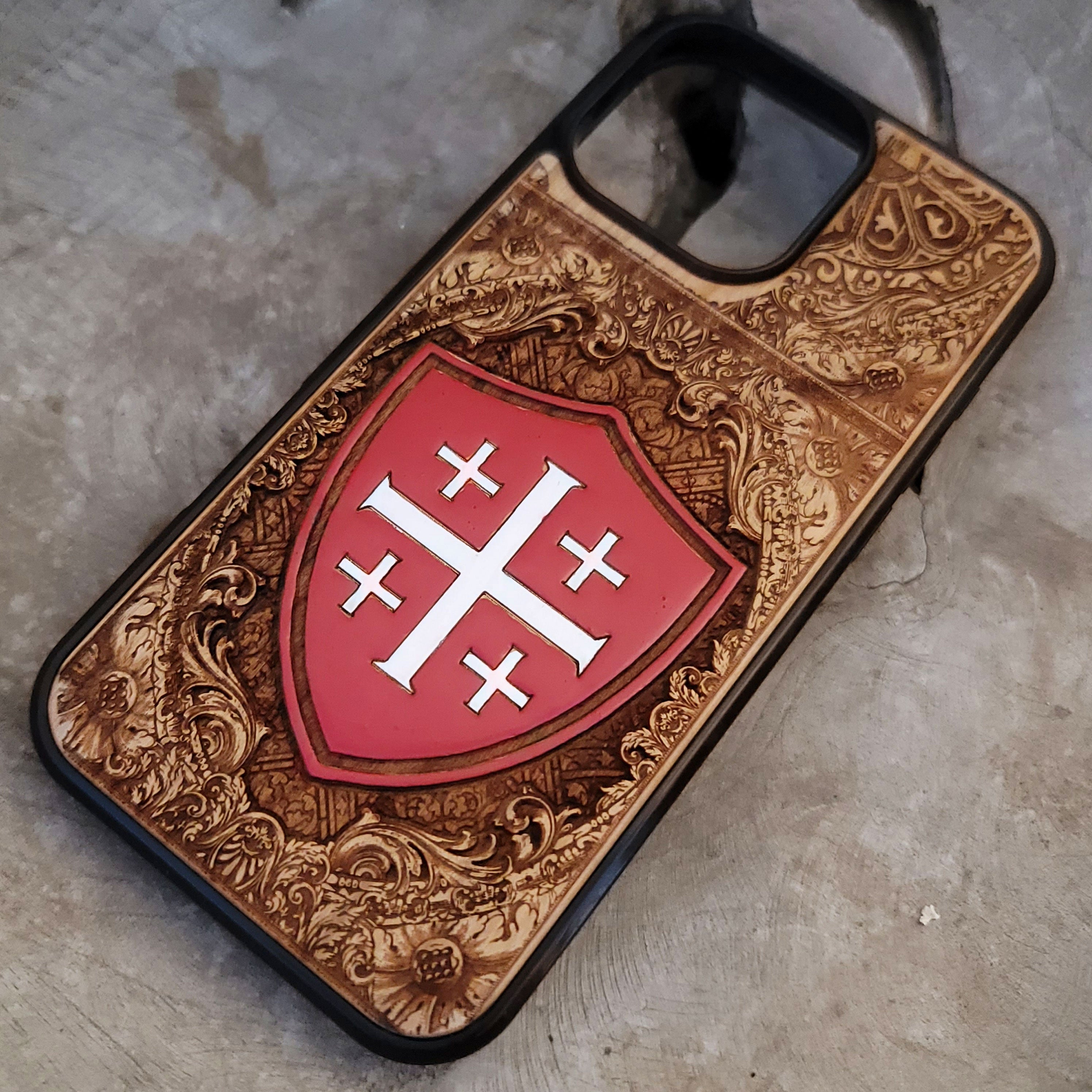 Hand painted Jerusalem Cross phone case with engraved shield design for iPhone 16 and Galaxy S25.