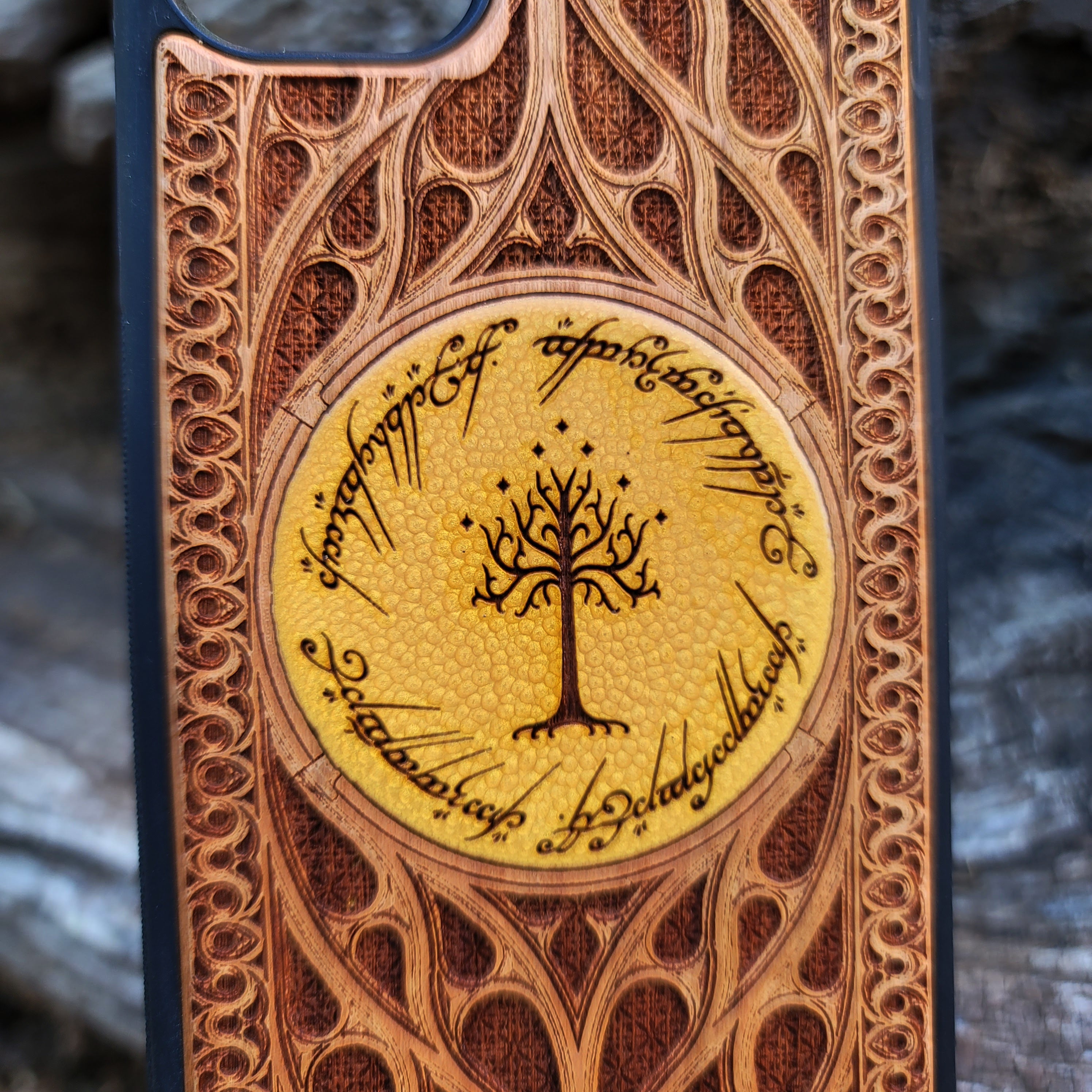 Lord of the Rings Gothic Design III wood phone case with a detailed laser-engraved Gothic pattern inspired by Middle-Earth. Compatible with iPhone , 15, 14, 13, 12, 11 Pro Max Mini and Samsung Galaxy S, S24, S23, S22, S21, S20 Ultra Plus, Note 20. Unique, slim, and durable design for fans of LOTR.