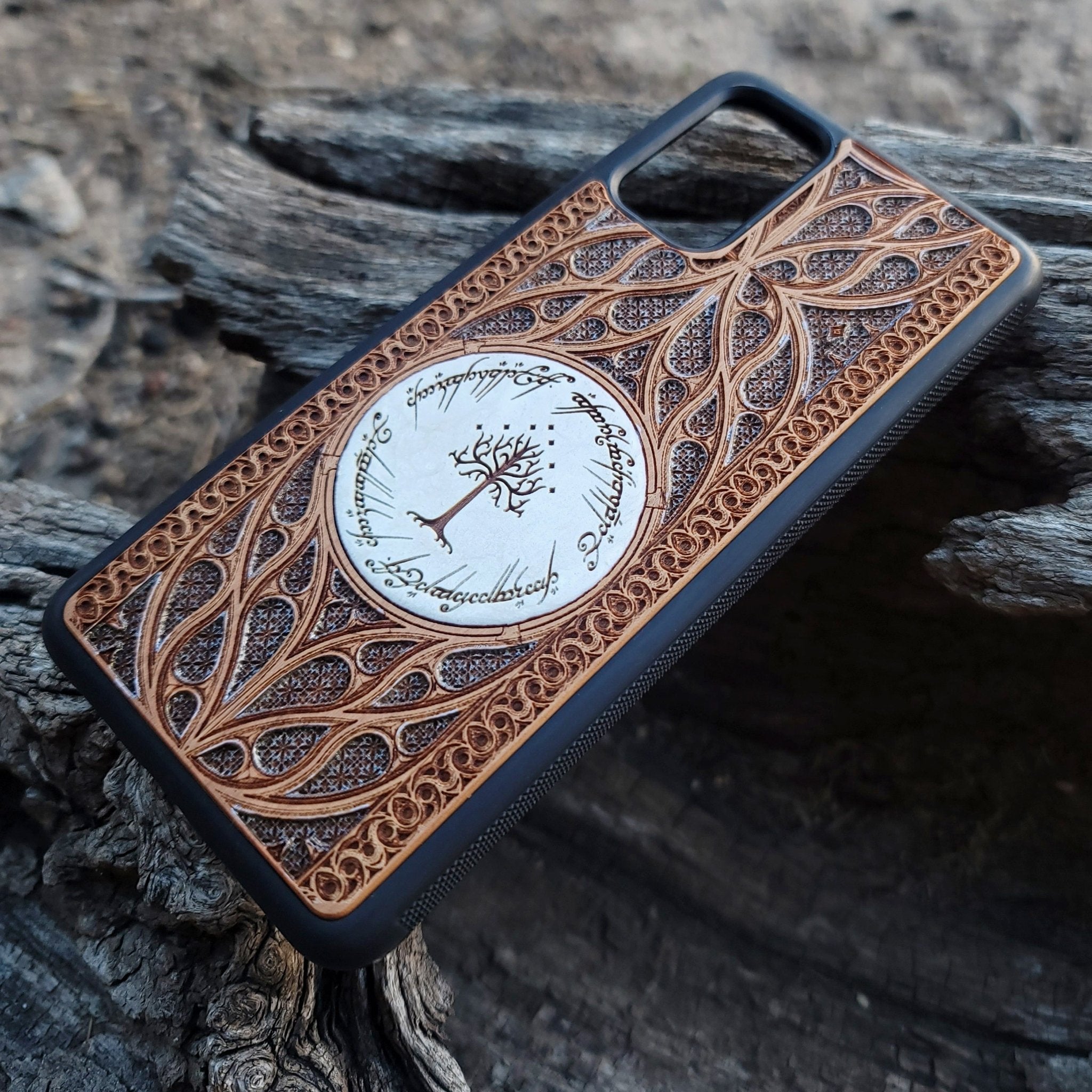 Wooden phone case for iPhone and Samsung Galaxy featuring a runic inscription and Gothic pattern design, laser-engraved for a unique look. Slim, durable, and compatible with iPhone 15, 14, 13, 12, 11 Pro Max Mini, and Samsung Galaxy S24, S23, S22, S21, S20 Ultra, Plus, Note 20. Order now for a stylish and functional phone upgrade!