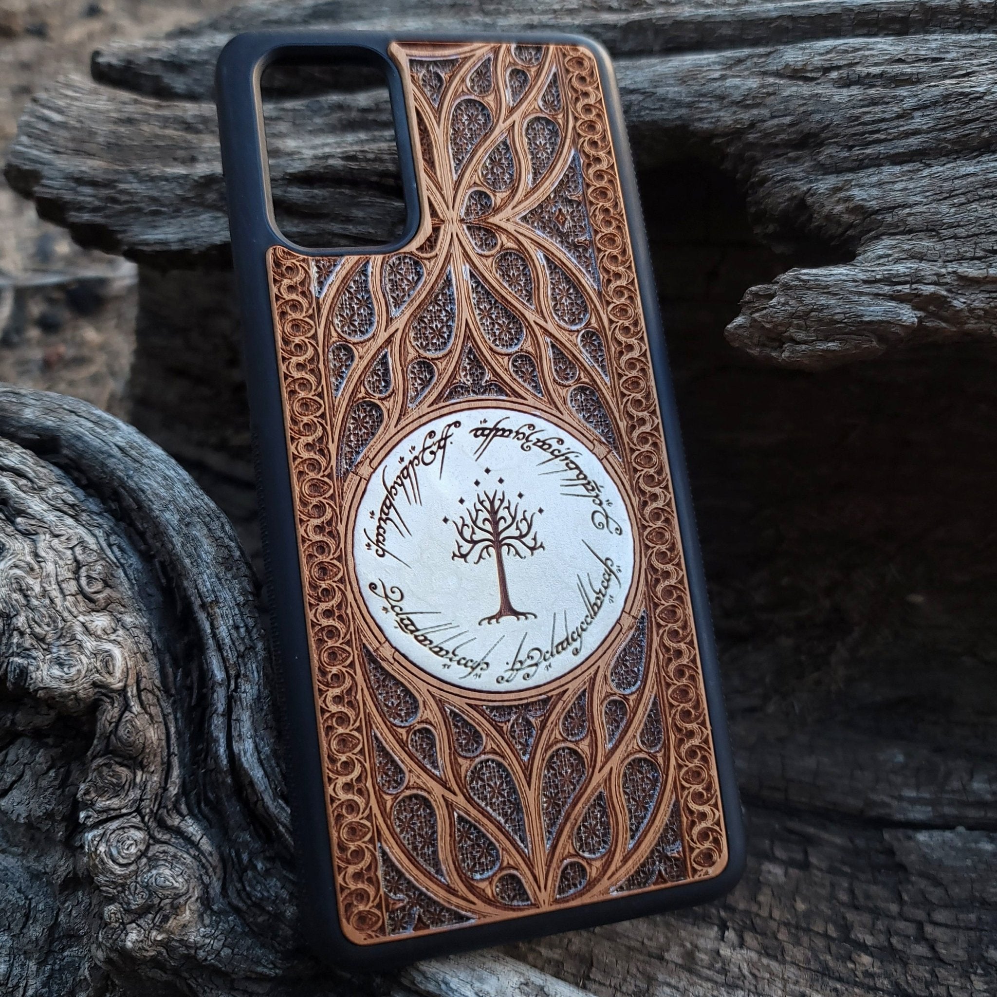 Wooden phone case for iPhone and Samsung Galaxy featuring a runic inscription and Gothic pattern design, laser-engraved for a unique look. Slim, durable, and compatible with iPhone 15, 14, 13, 12, 11 Pro Max Mini, and Samsung Galaxy S24, S23, S22, S21, S20 Ultra, Plus, Note 20. Order now for a stylish and functional phone upgrade!