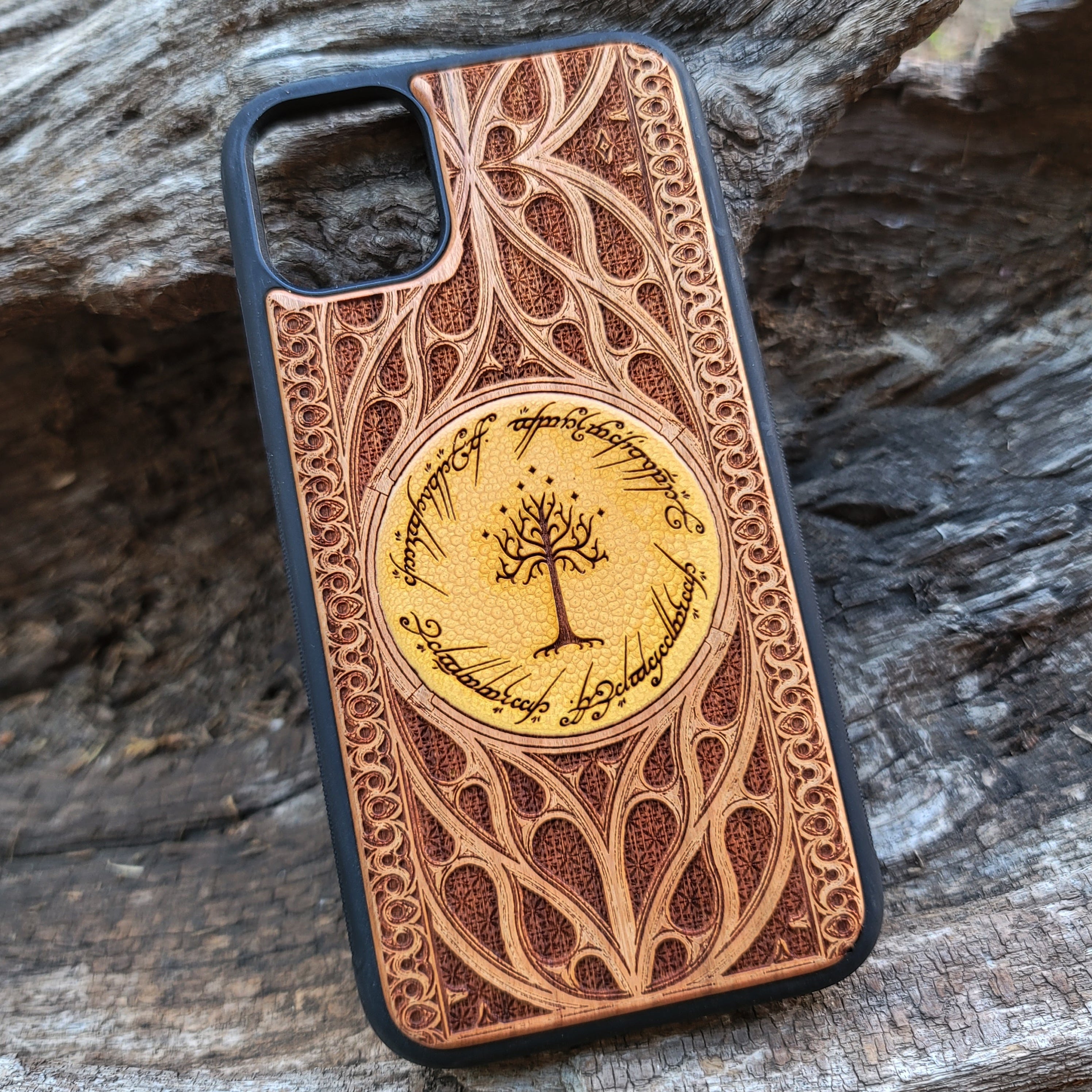 Lord of the Rings Gothic Design III wood phone case with a detailed laser-engraved Gothic pattern inspired by Middle-Earth. Compatible with iPhone , 15, 14, 13, 12, 11 Pro Max Mini and Samsung Galaxy S, S24, S23, S22, S21, S20 Ultra Plus, Note 20. Unique, slim, and durable design for fans of LOTR.
