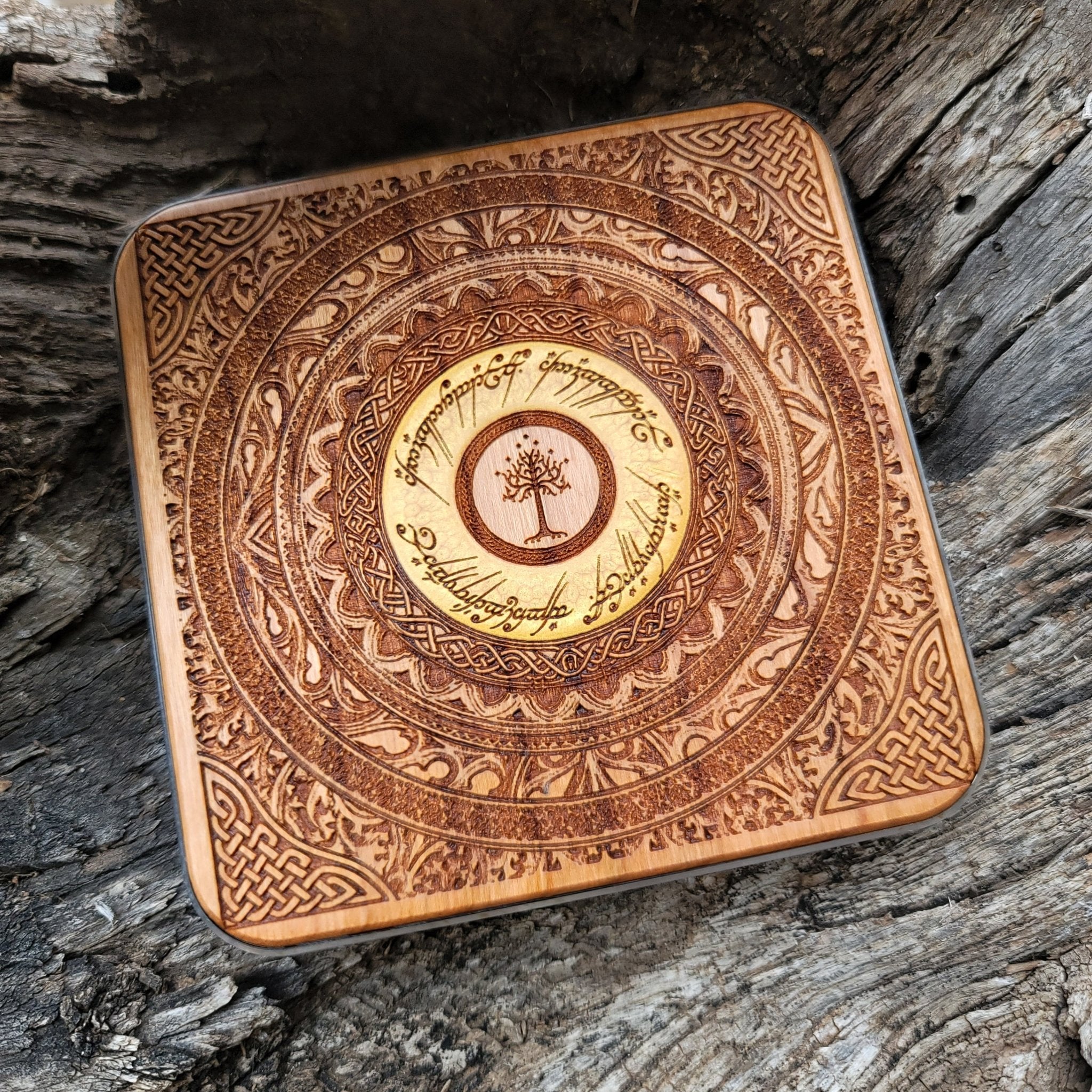 Artisan wireless charger engraved with Middle-earth runes.