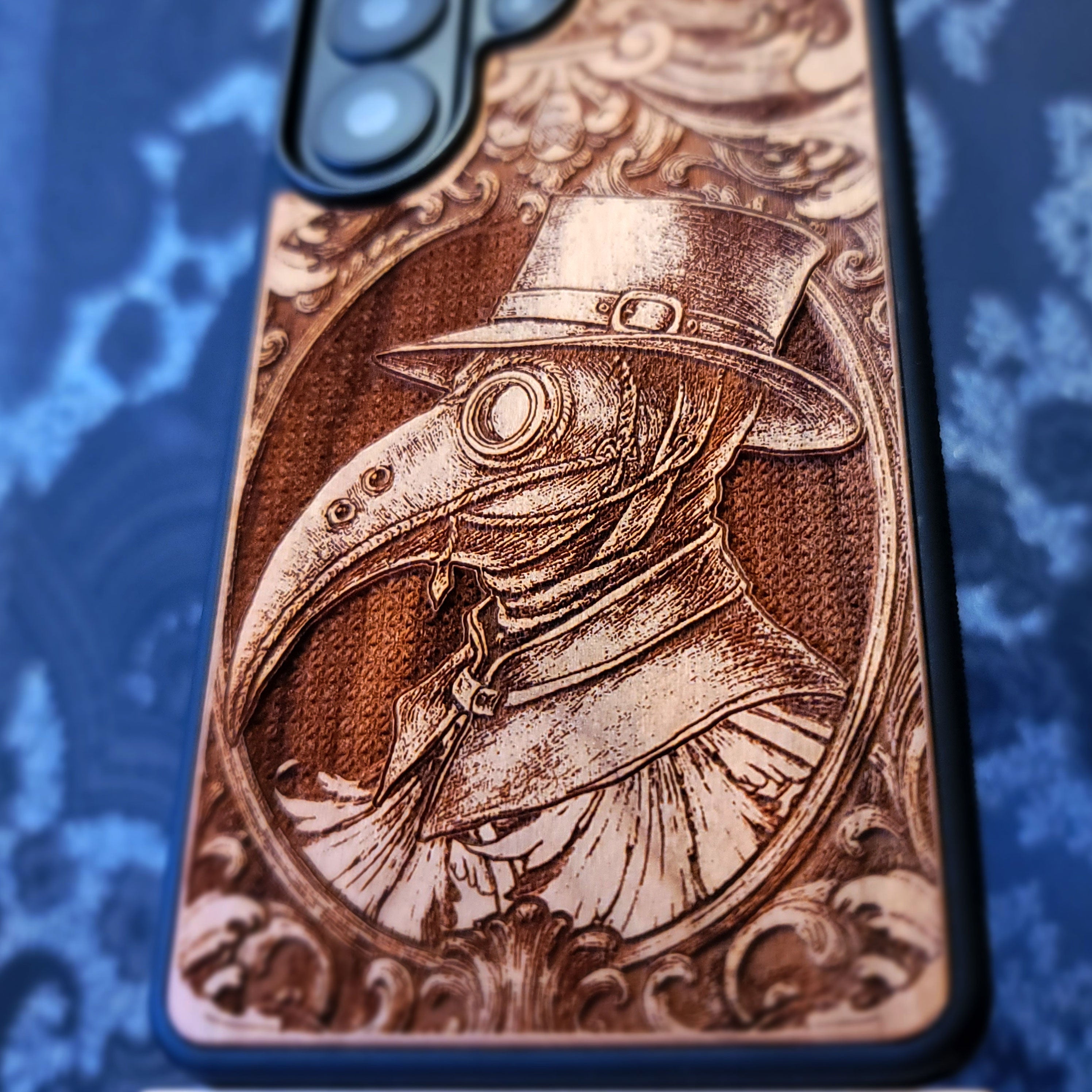 Deep laser engraved wooden phone case featuring a gothic Plague Doctor design on natural wood for iPhone and Samsung Galaxy.