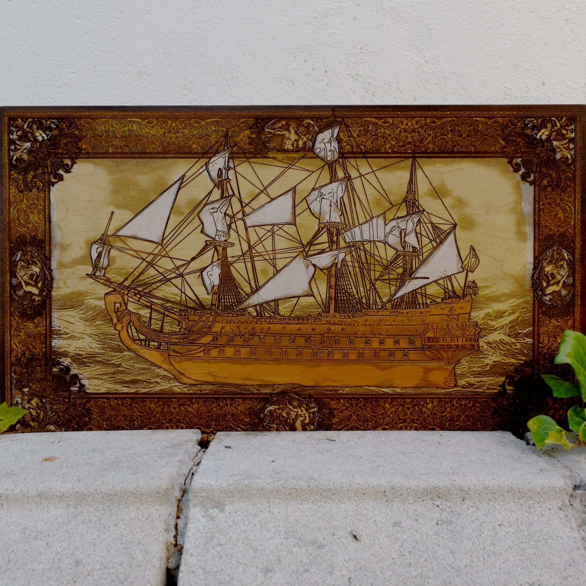 Engraved wooden wall art with detailed sailing ship design, nautical maritime home décor