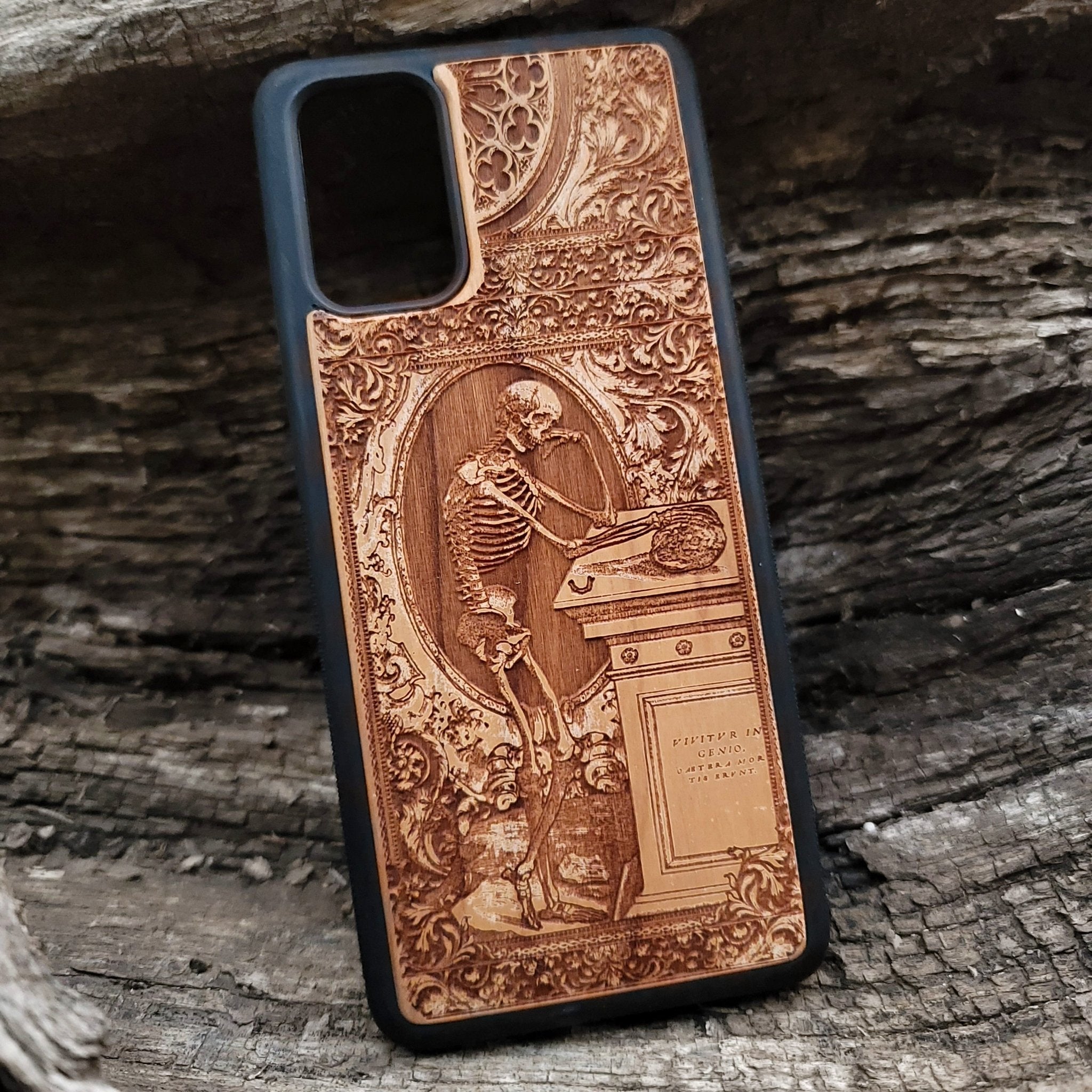 Wooden phone case with a gothic thinking skeleton design, intricately carved for iPhone , iPhone 15, Galaxy S23 Ultra, Note 20, and more. Perfect for gothic art lovers and unique phone accessories.