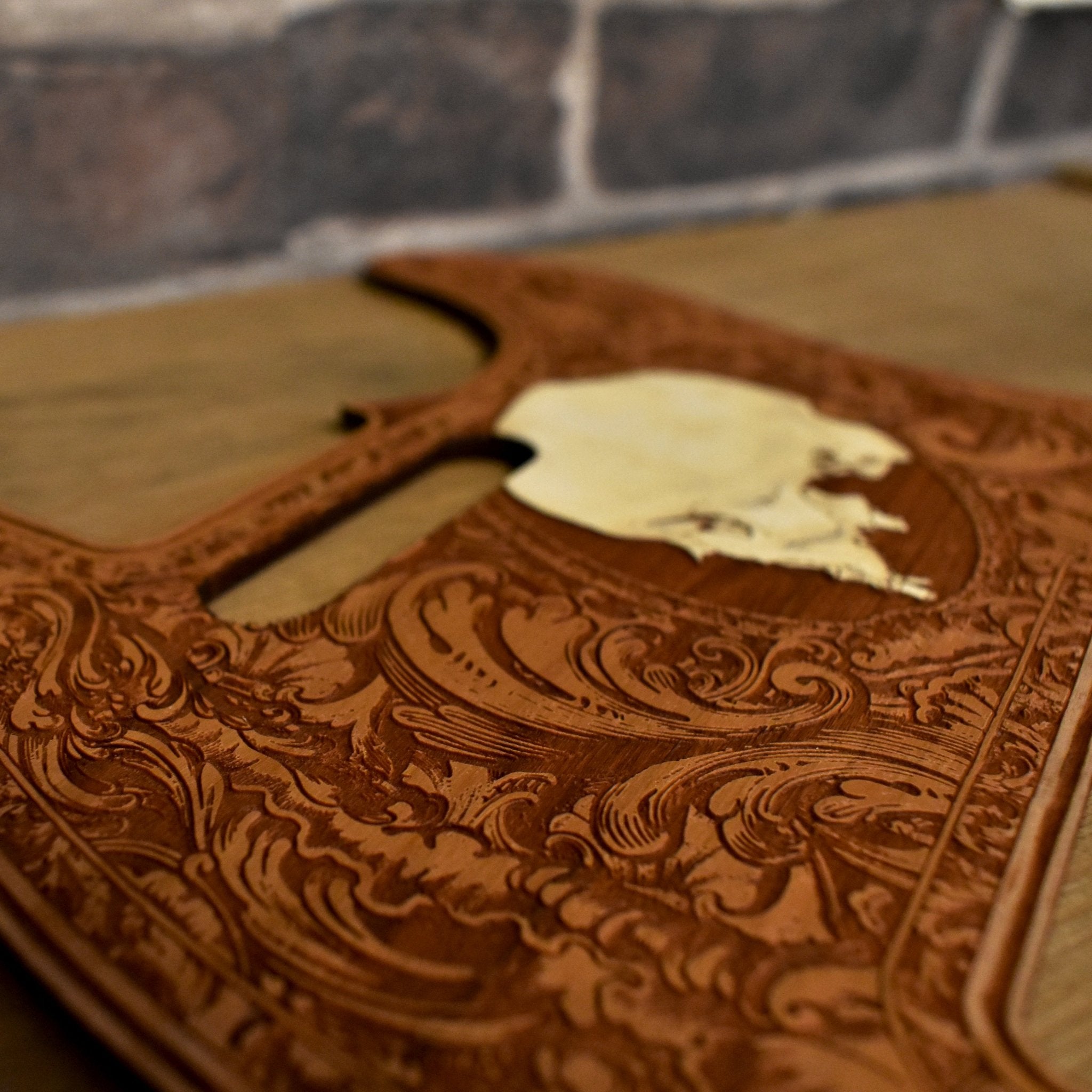 Artistic laser-engraved skull design on hand-painted cherry wood pickguard for Fender Telecaster