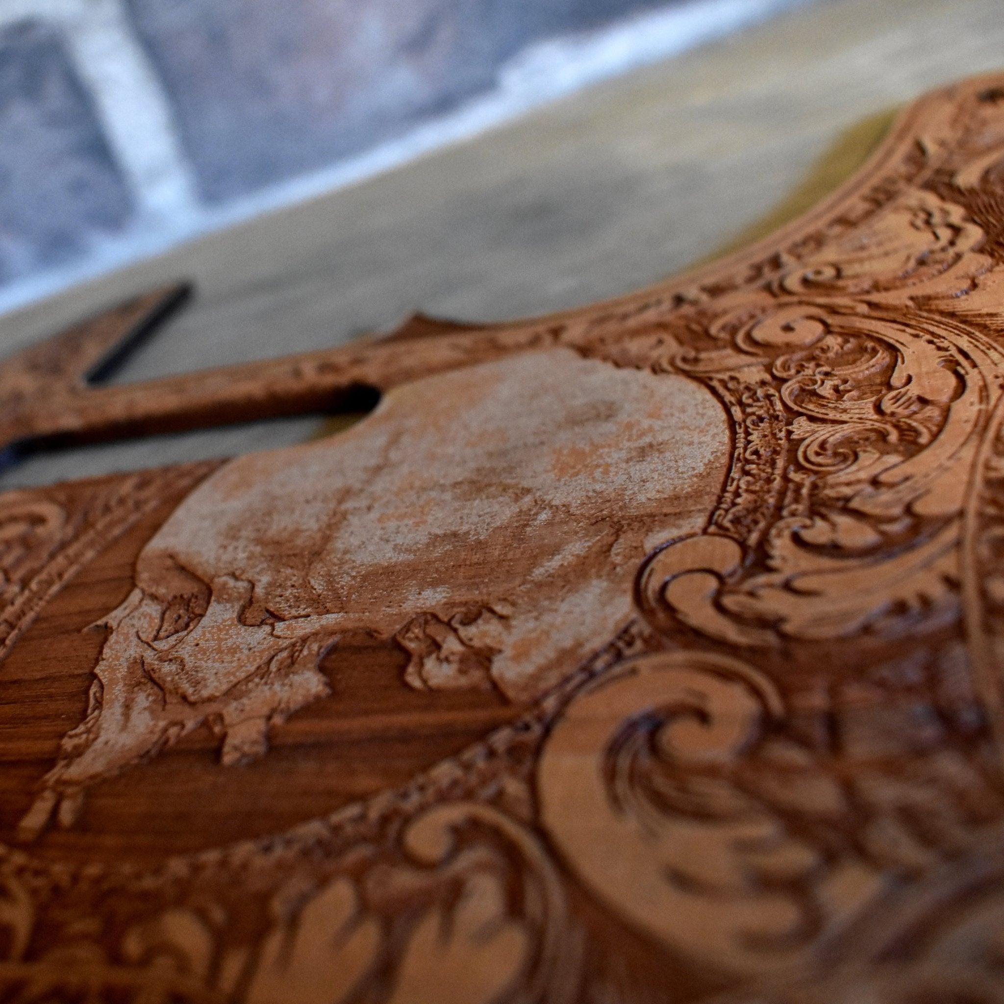 8-hole Fender Telecaster cherry wood pickguard with detailed skull engraving