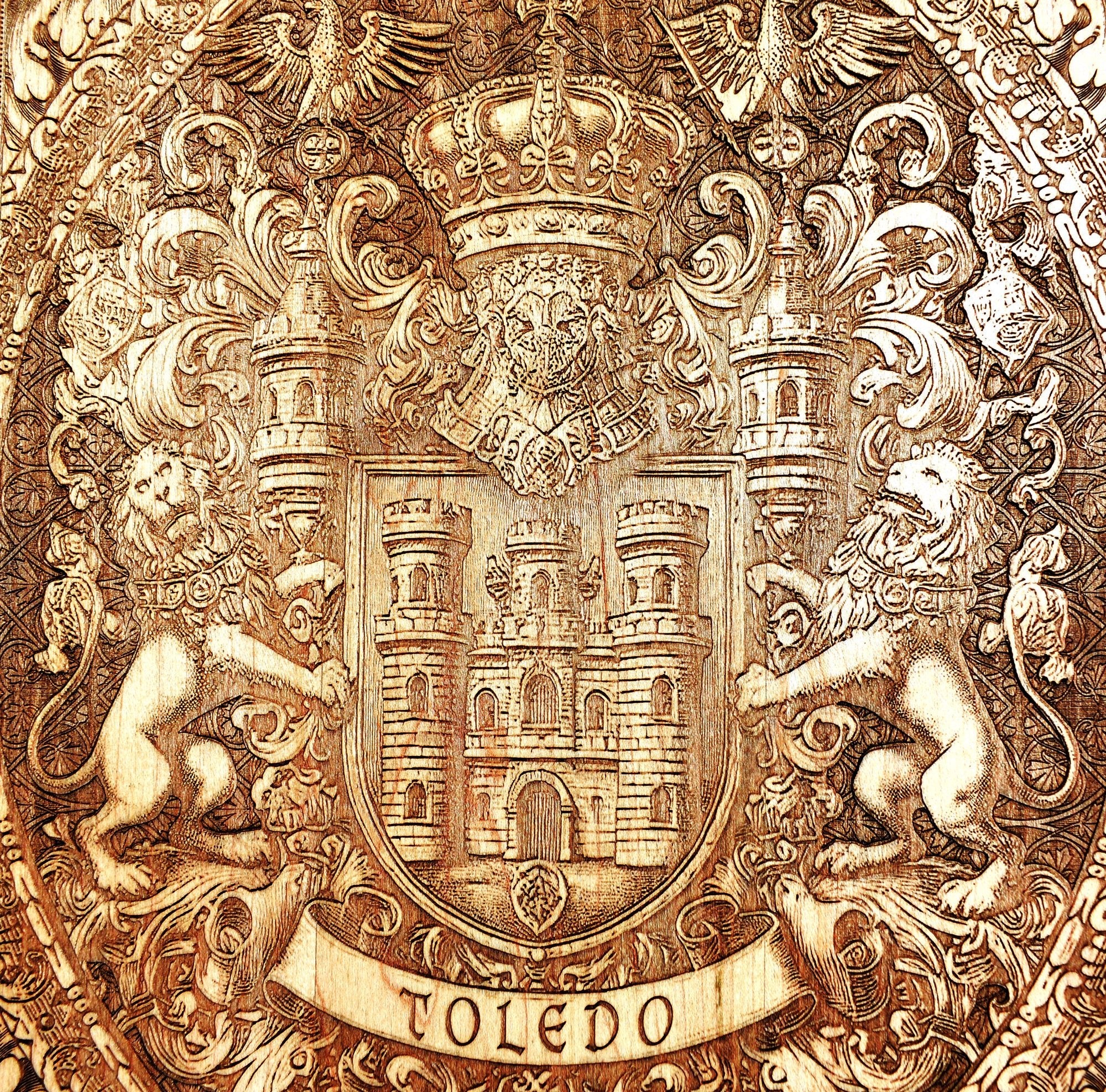 Handcrafted Toledo coat of arms wall plaque, engraved on dark cherry wood.