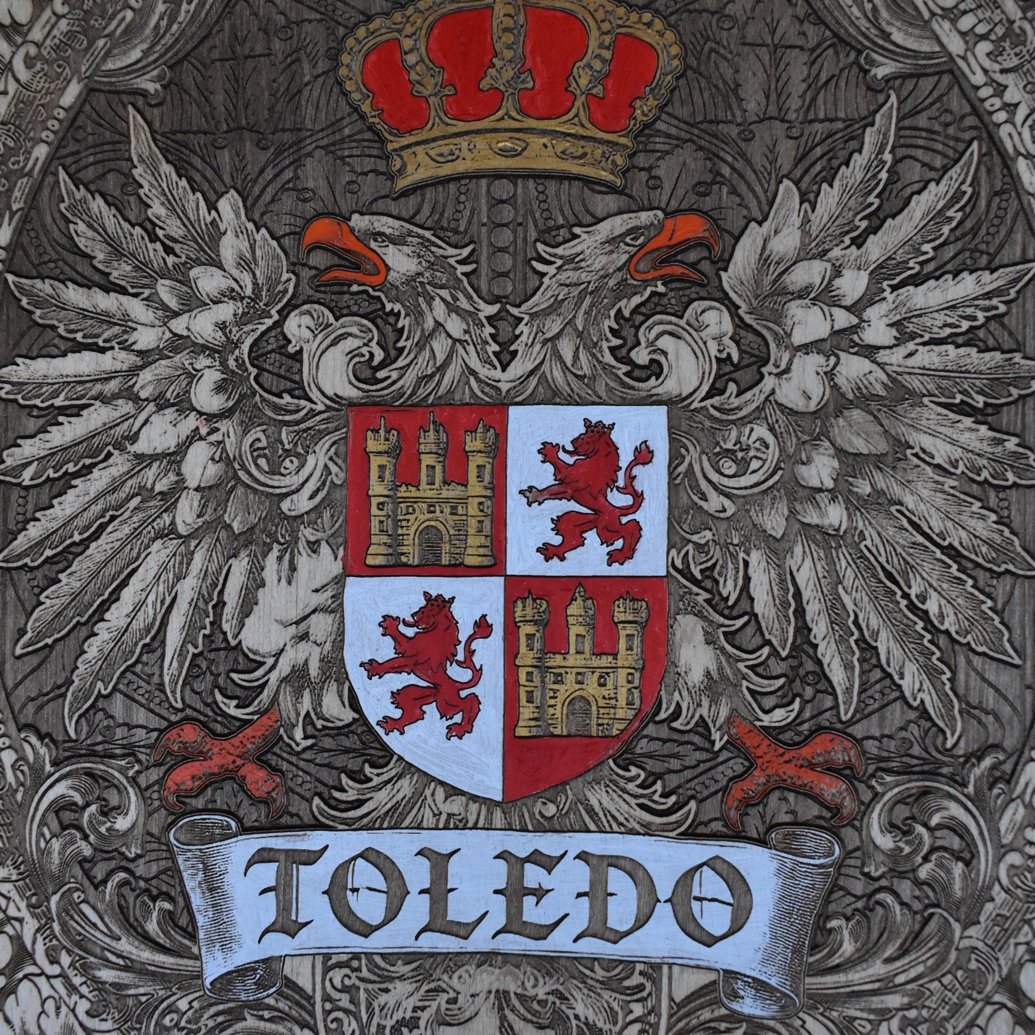 Maple wood art plaque with detailed Toledo family crest