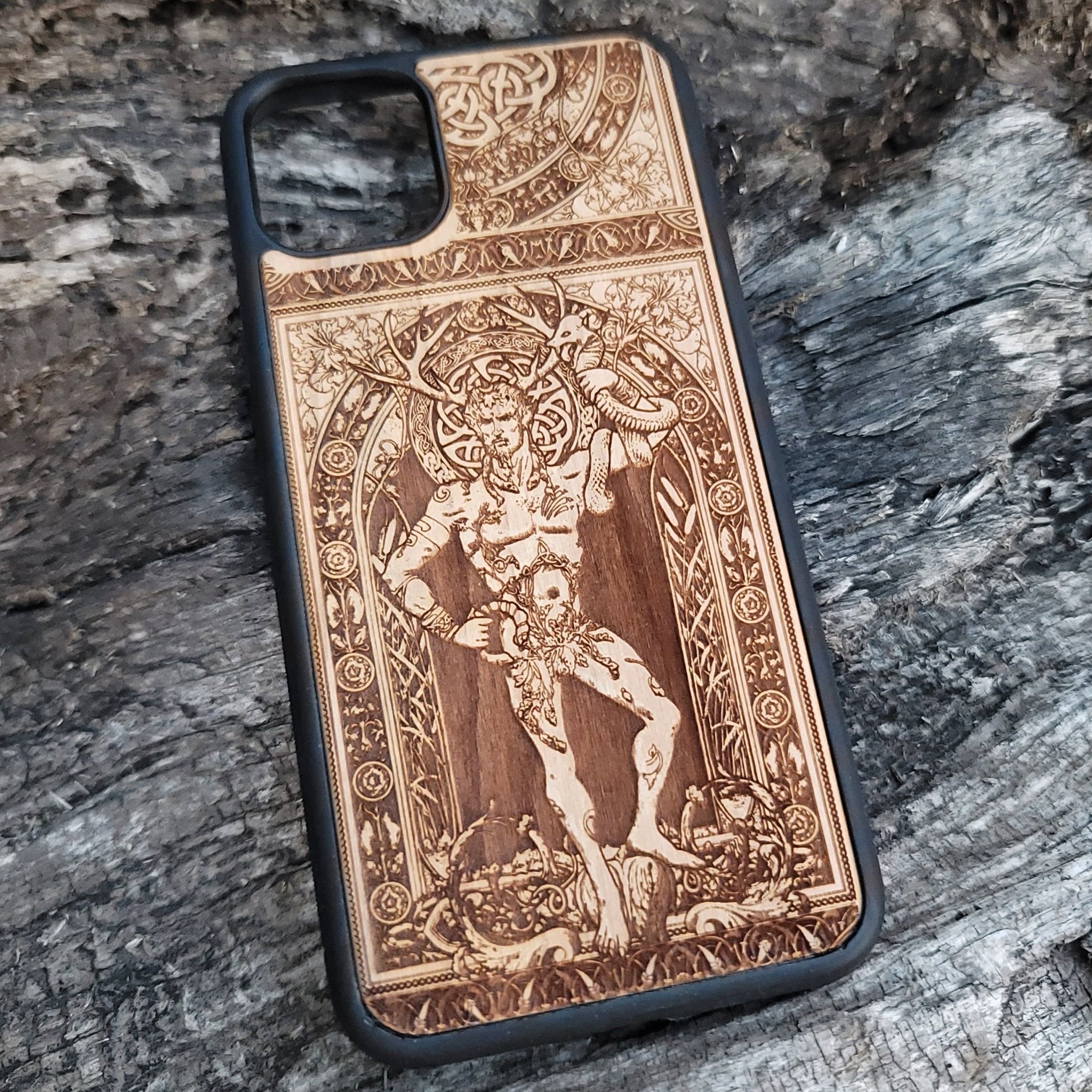 Wooden phone case featuring a detailed engraving of Cernunnos God, with Celtic-inspired design, compatible with iPhone , iPhone 15, Galaxy S, Note 20, and other models. Perfect for fans of gothic and Celtic art.