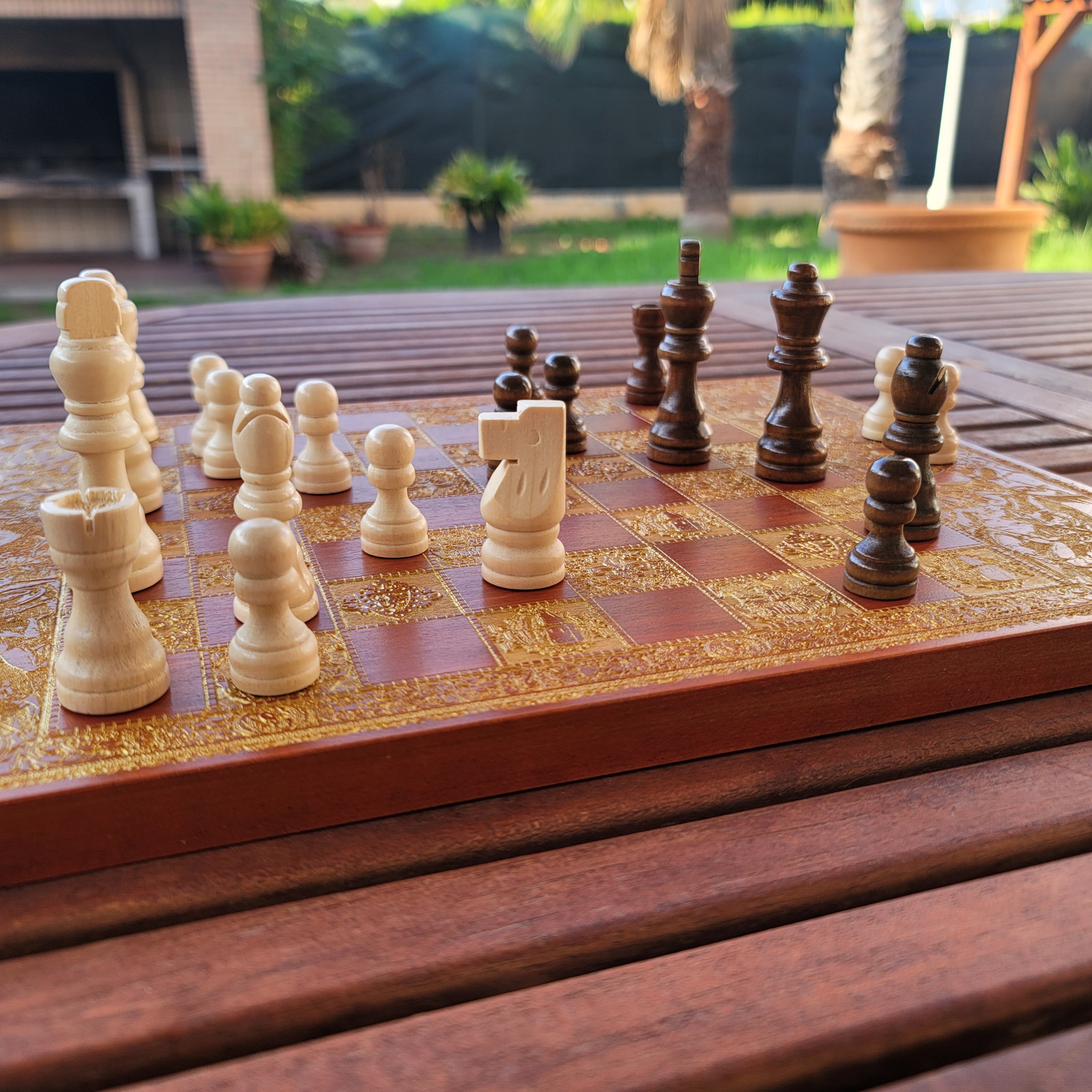 Close-up of luxury wooden chessboard, perfect 5-year anniversary gift for chess lovers