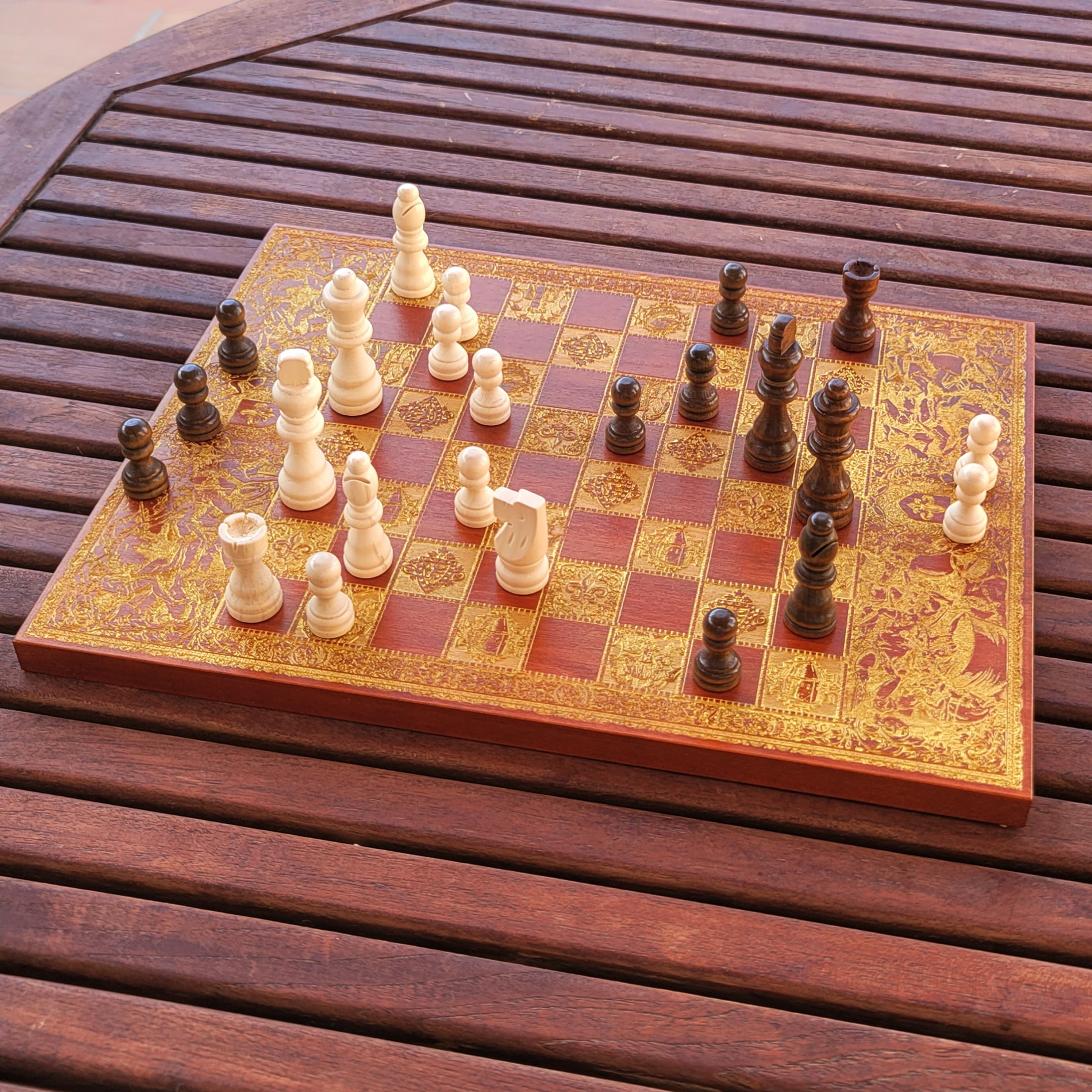 Premium laser-engraved chessboard with battle-style artwork, great for gifts & decor