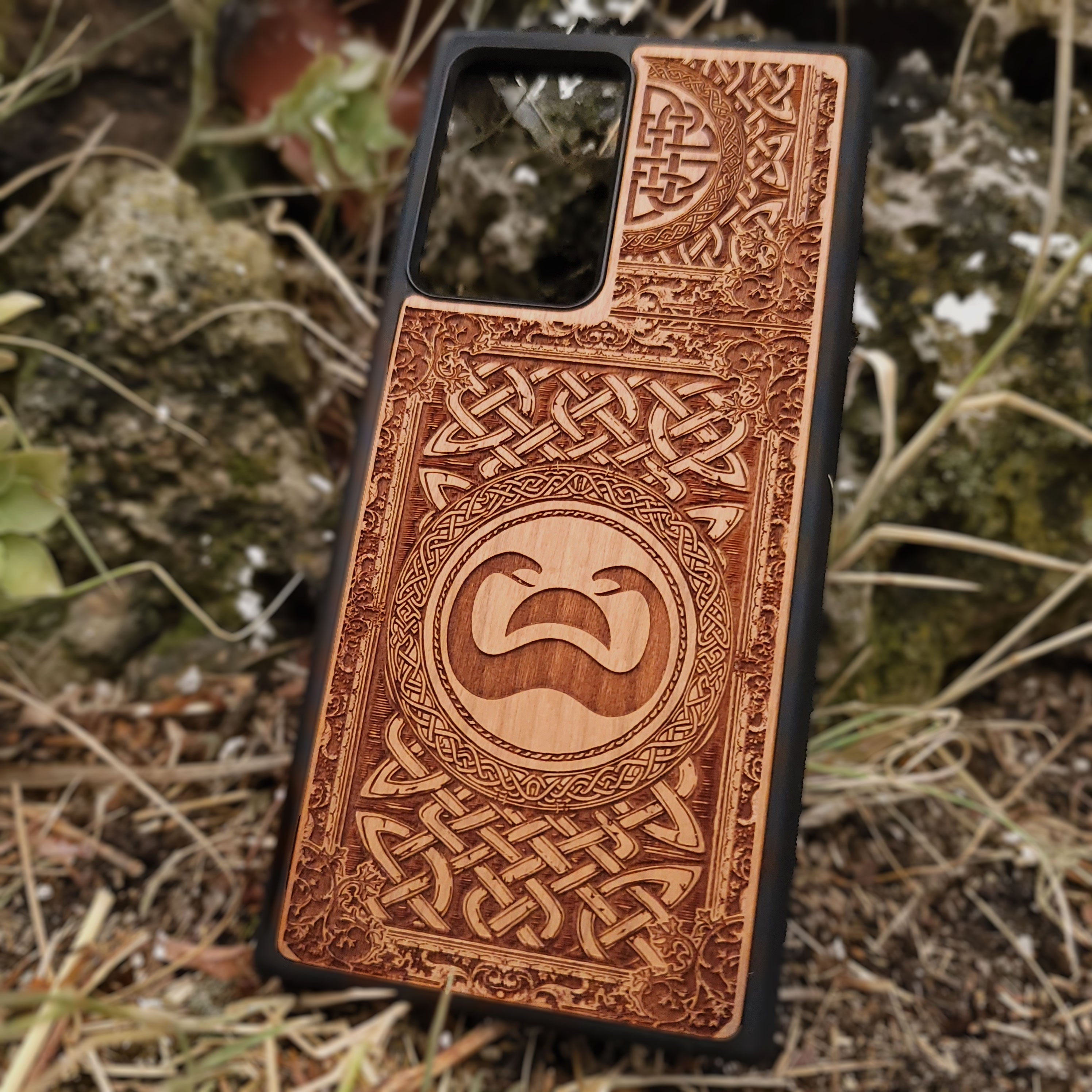 Wood phone case with Conan the Barbarian snake symbol and Celtic engravings for iPhone and Galaxy