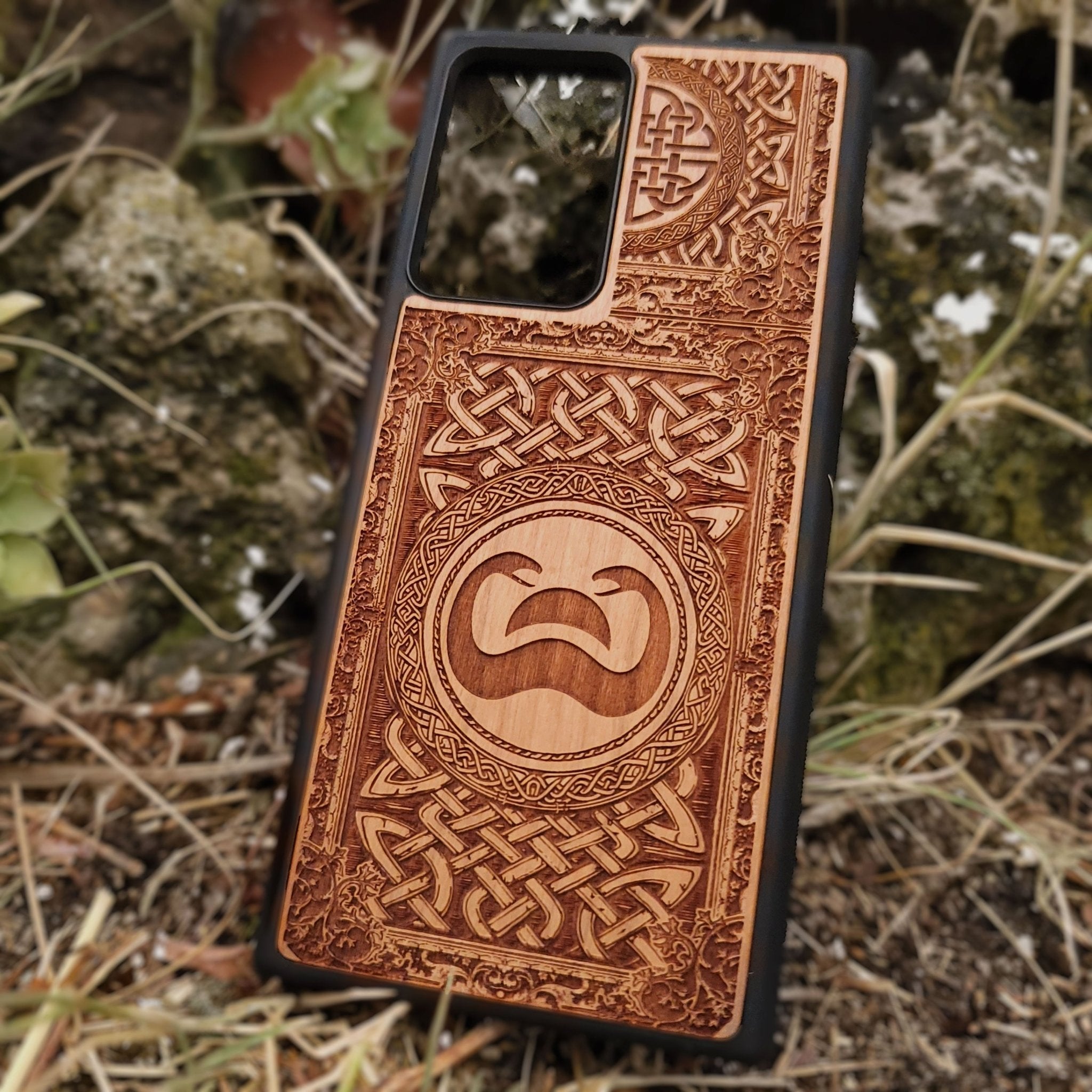Wood phone case with Conan the Barbarian snake symbol and Celtic engravings for iPhone and Galaxy