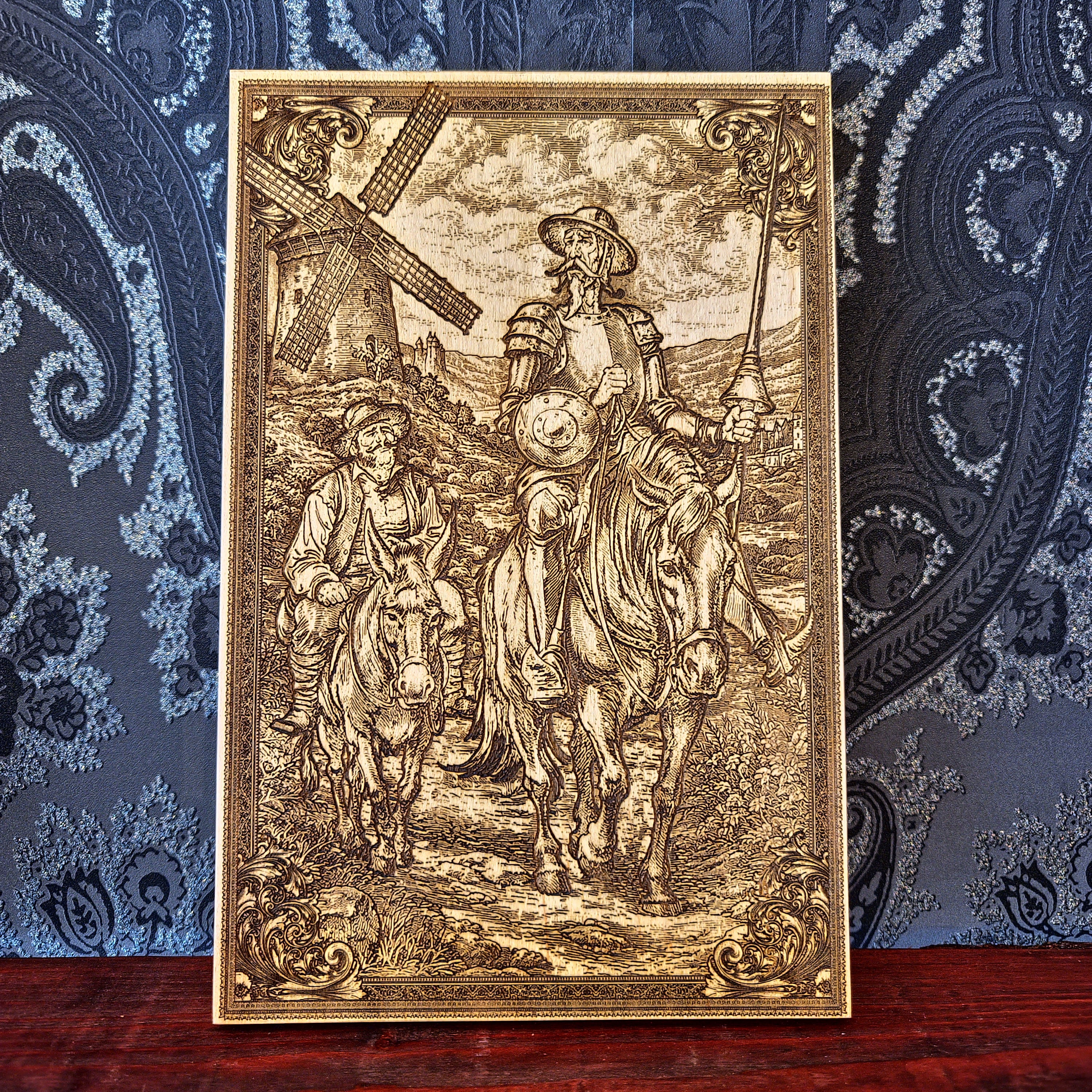 Laser engraved wood artwork of Don Quixote and Sancho Panza inspired by Cervantes, rustic literary wall art