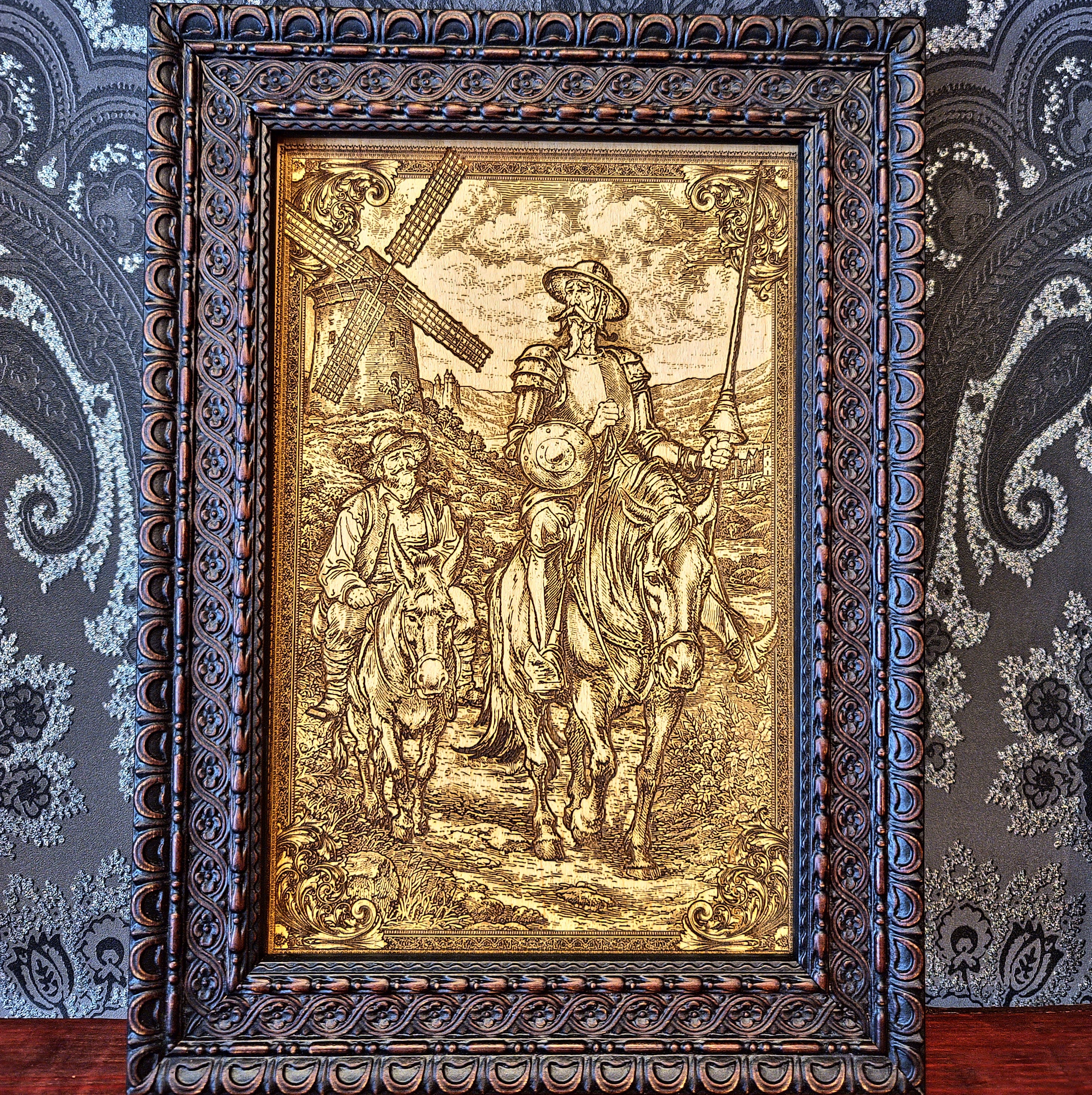 Laser engraved wood artwork of Don Quixote and Sancho Panza inspired by Cervantes, rustic literary wall art