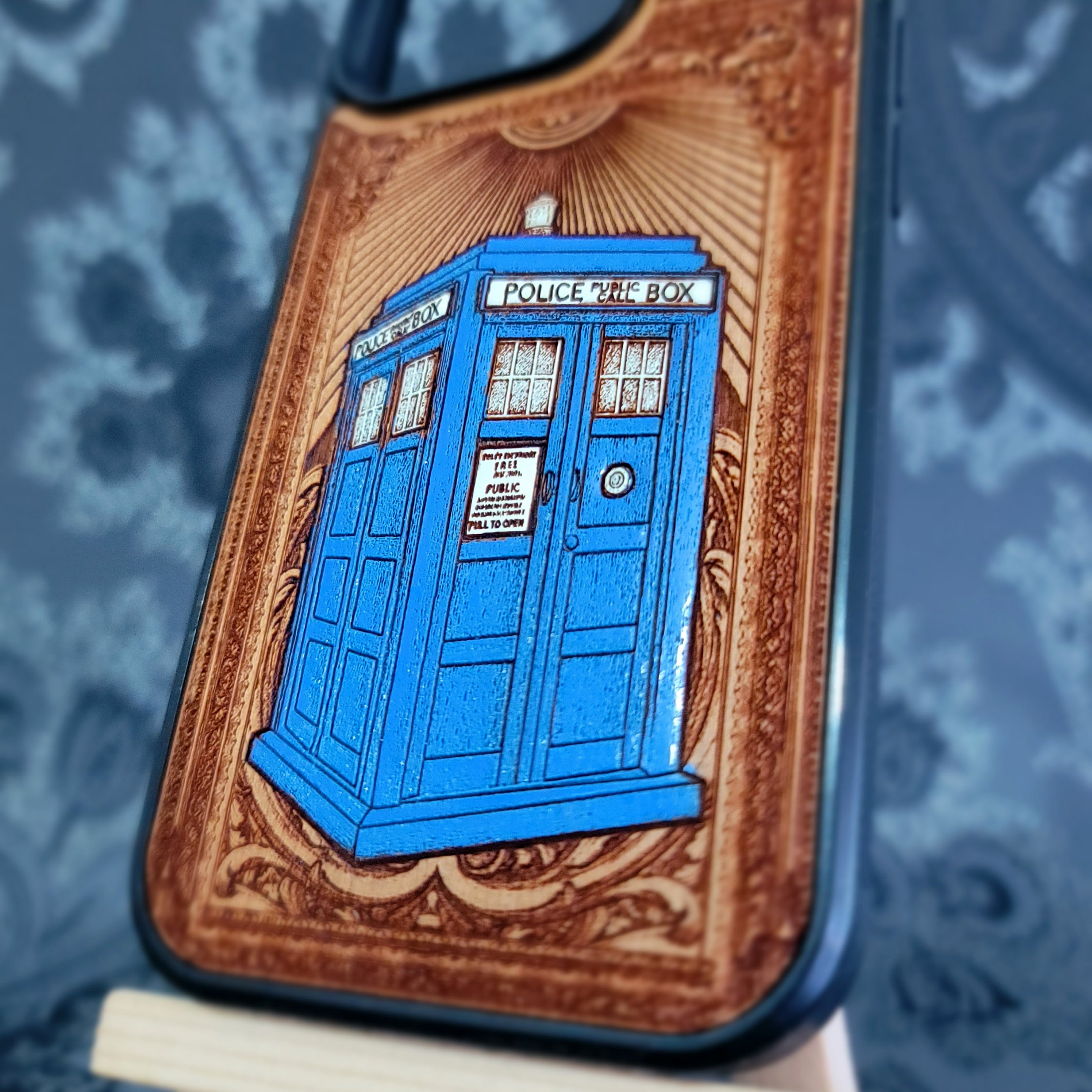 DR WHO Deep laser engraved wooden phone case featuring a vintage police box inspired by classic time-travel sci-fi on natural wood for iPhone and Samsung Galaxy models.