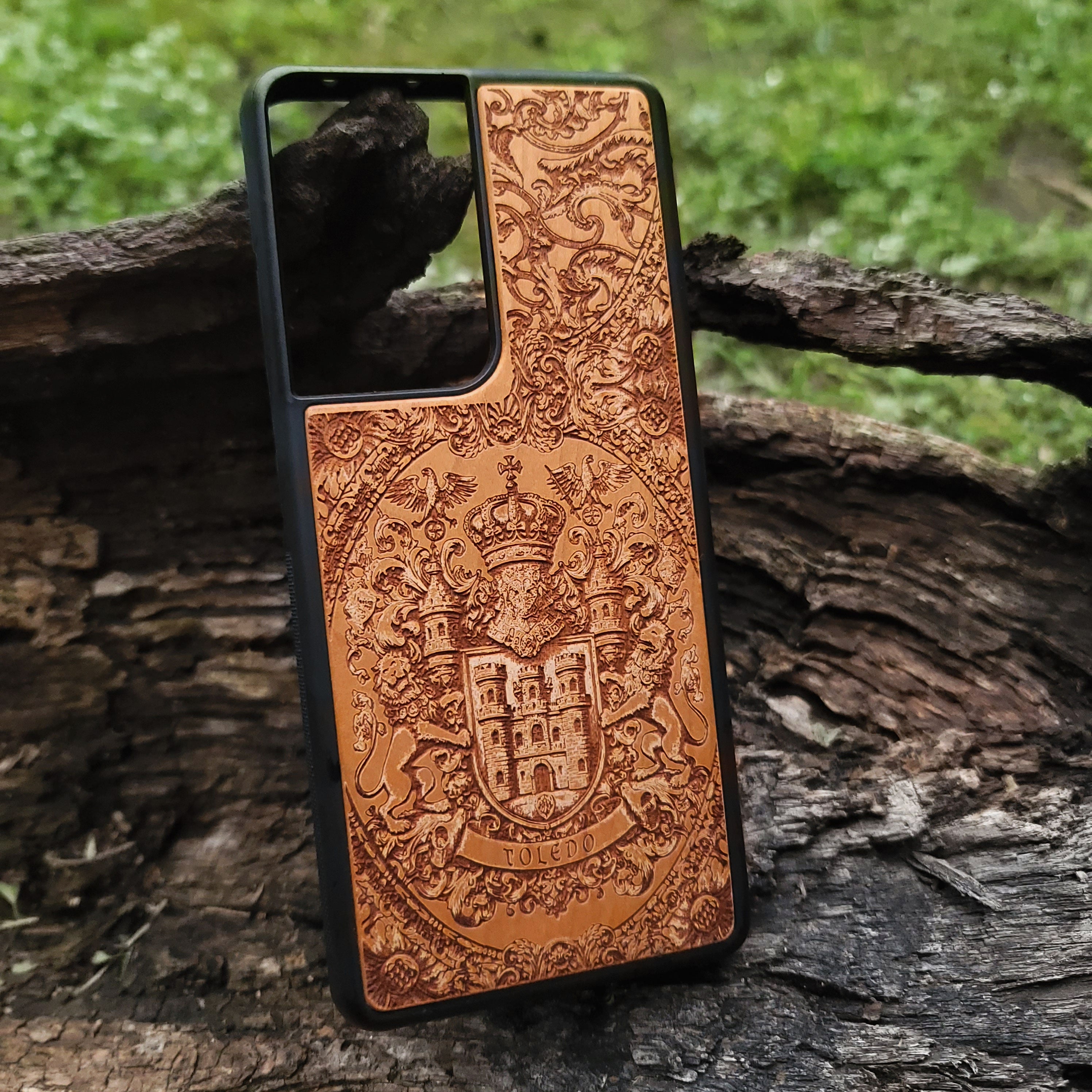 Toledo Spain coat of arms laser-engraved on premium wood phone case.