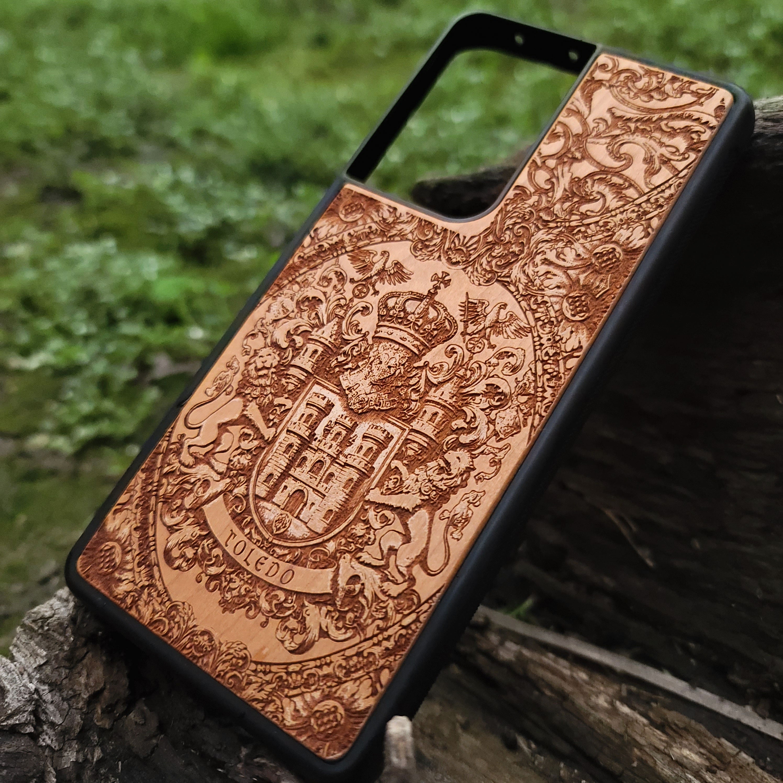 Custom wood phone case with Toledo crest, perfect for family heritage gifts.