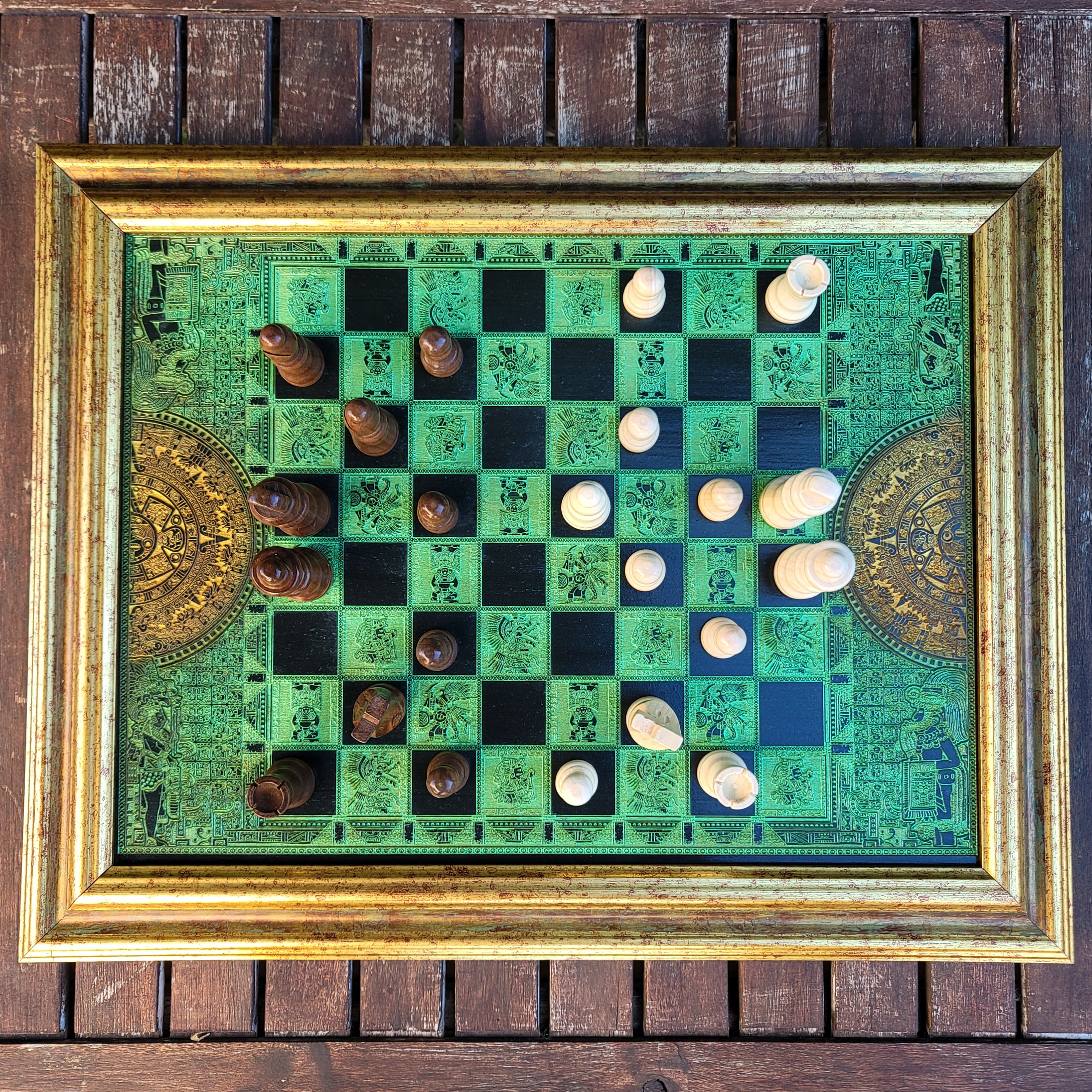 Luxury handcrafted Aztec green chessboard with intricate laser engravings