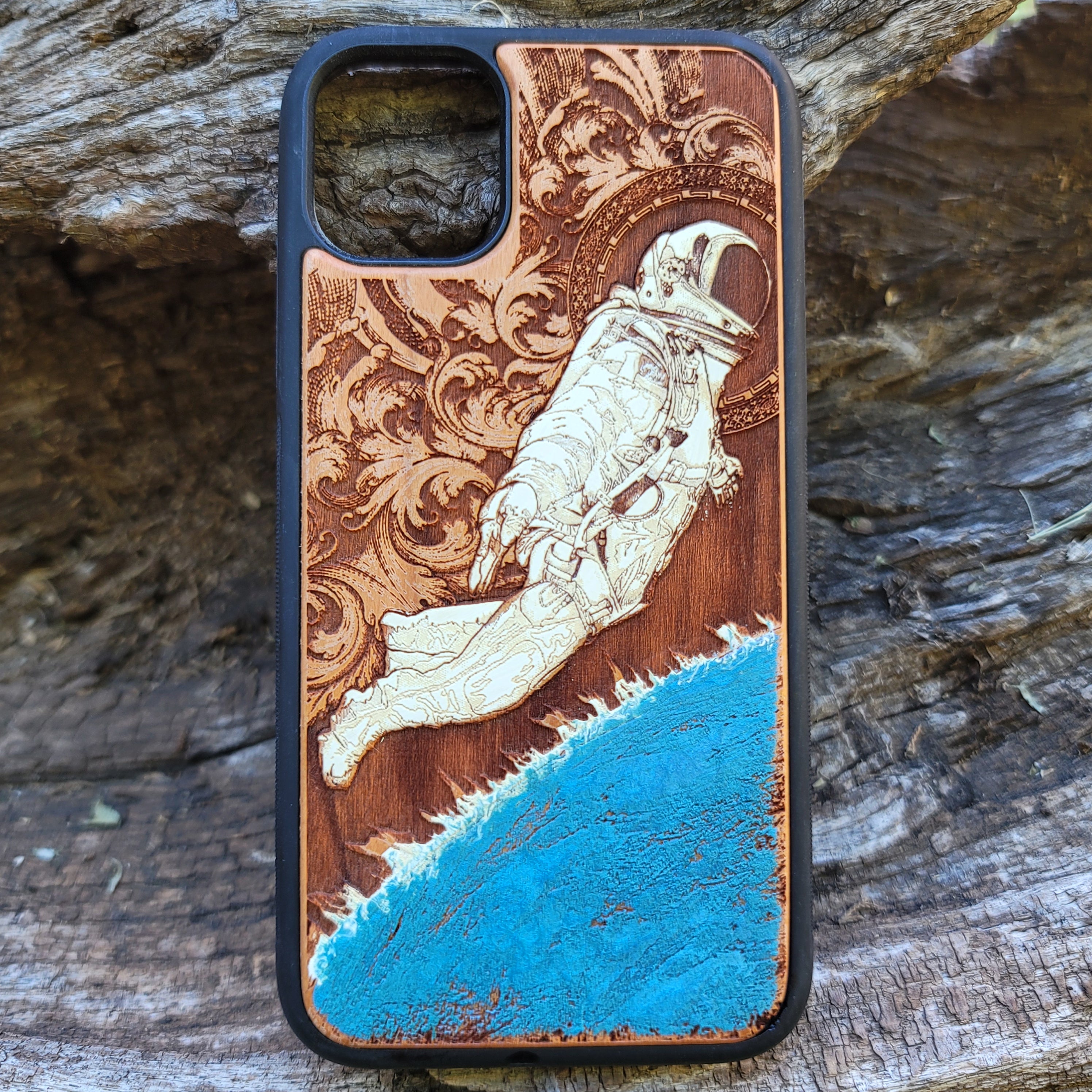 Laser-engraved wooden phone case for Samsung Galaxy, featuring intricate gothic artwork.
