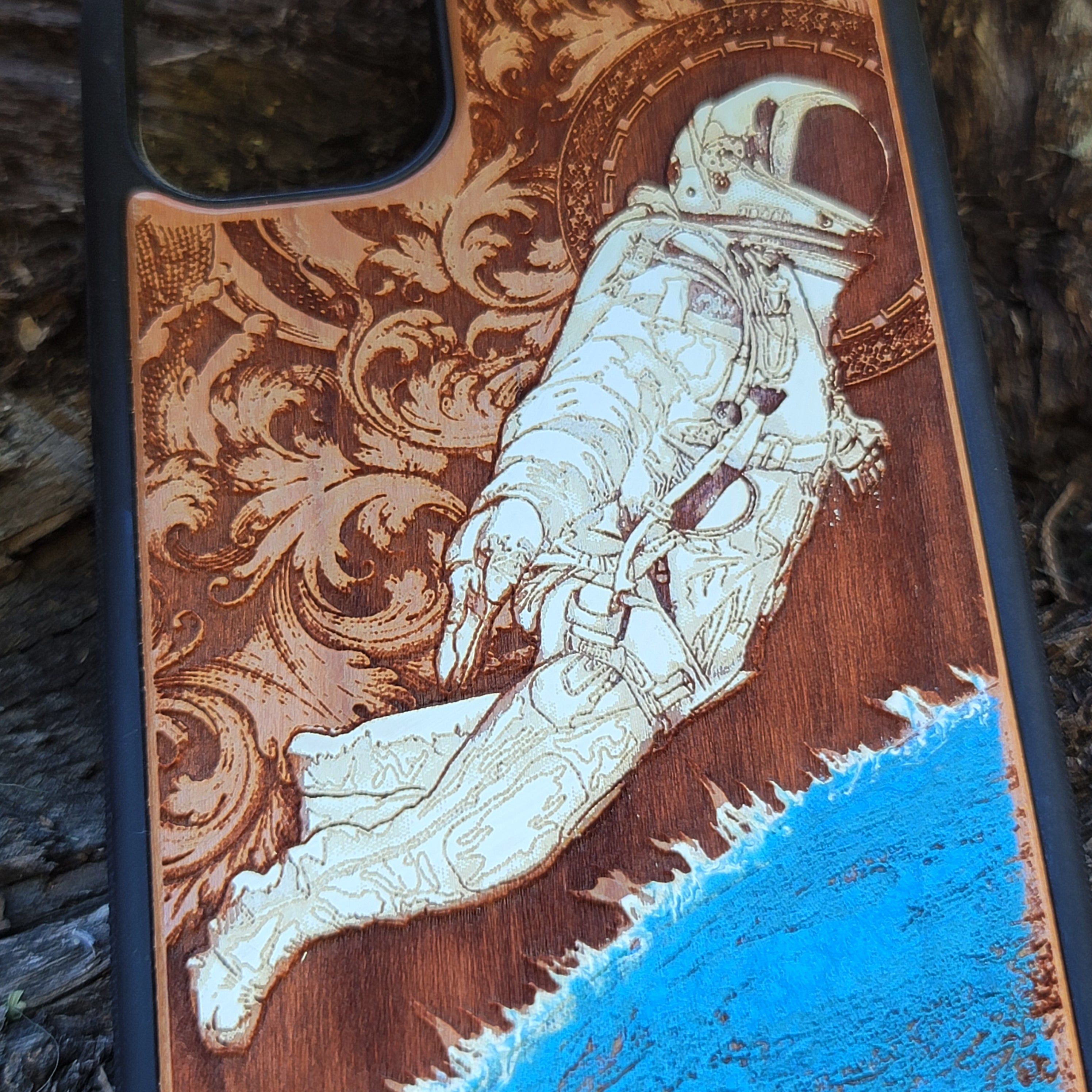Laser-engraved wooden phone case for Samsung Galaxy, featuring intricate gothic artwork.
