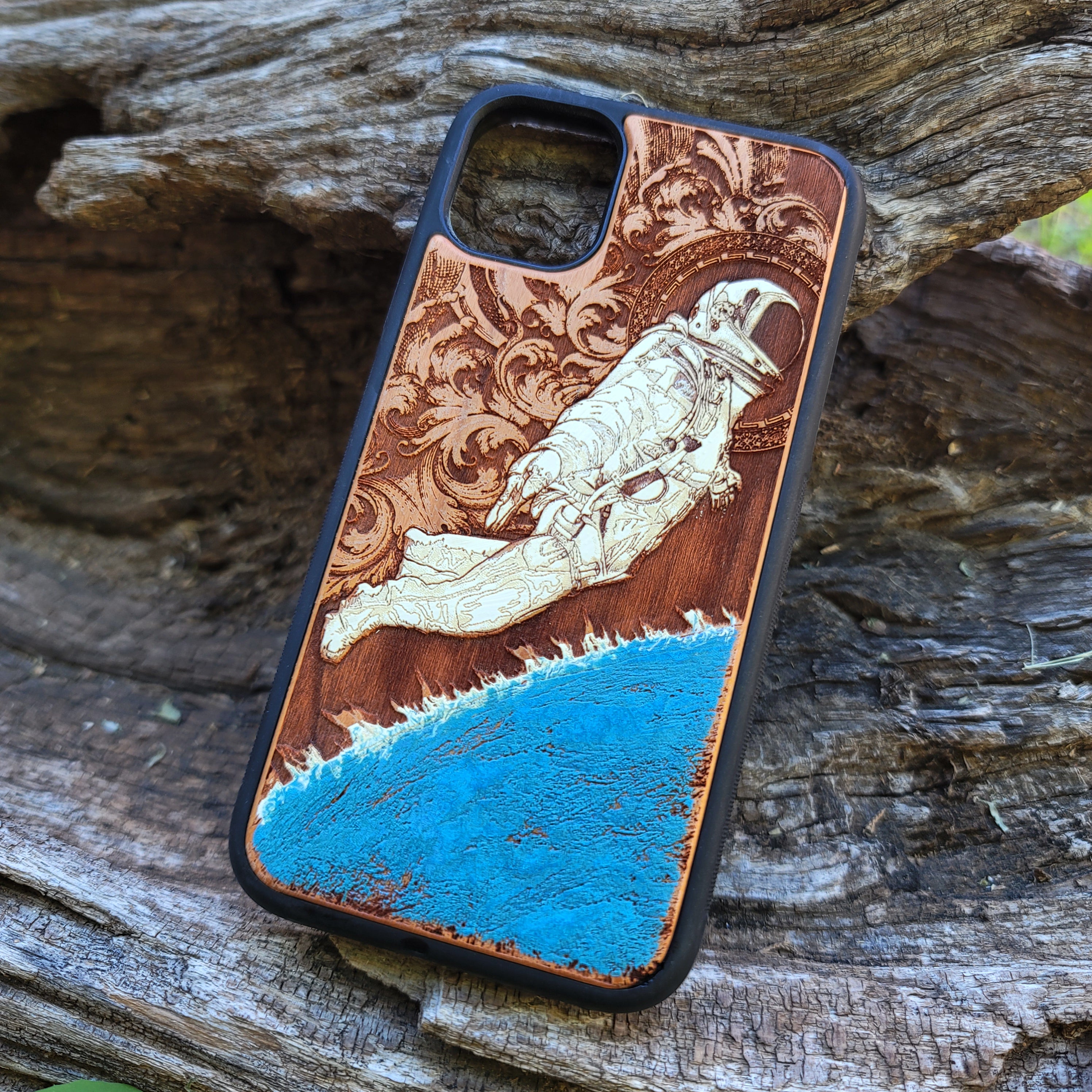 Laser-engraved wooden phone case for Samsung Galaxy, featuring intricate gothic artwork.
