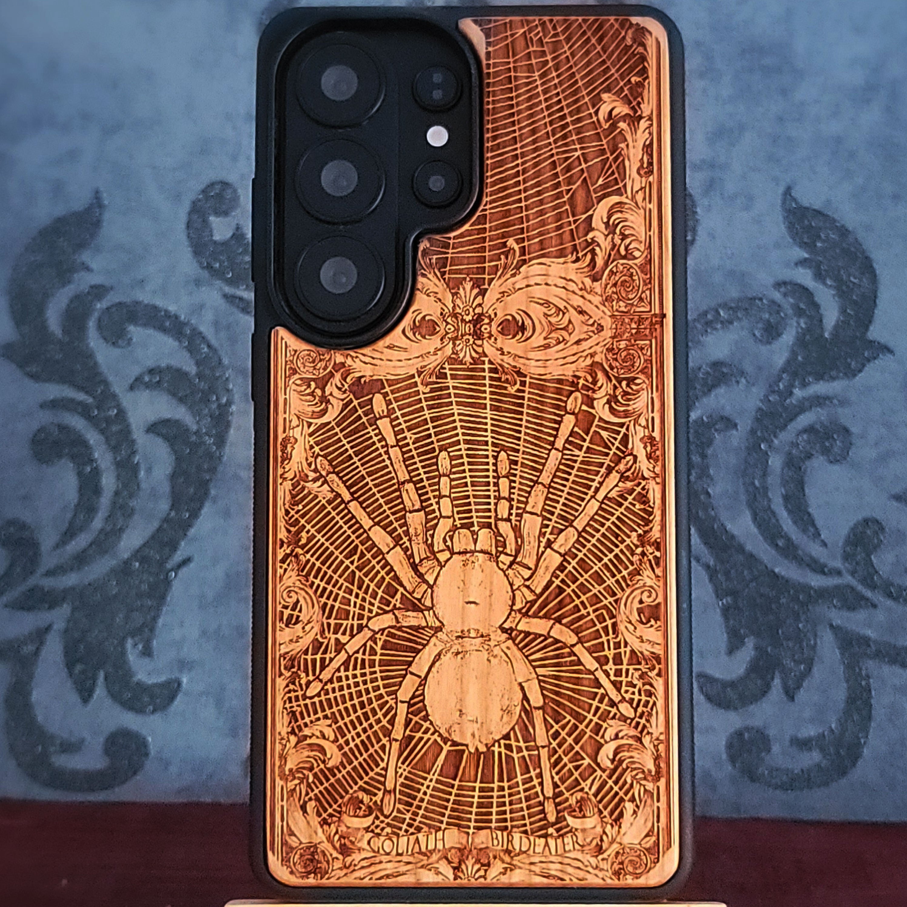 Laser-engraved Goliath Birdeater spider wood phone case for iPhone and samsung Galaxy – arachnid-inspired wooden gift.