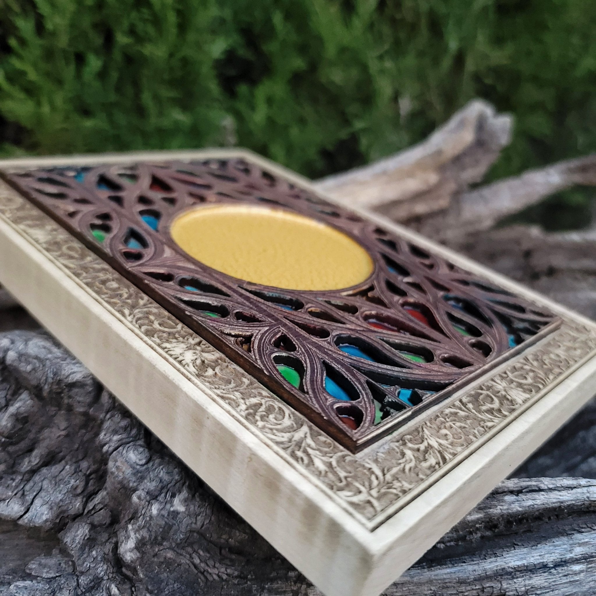 Stained glass look wood artwork with gothic window design and custom engraving.