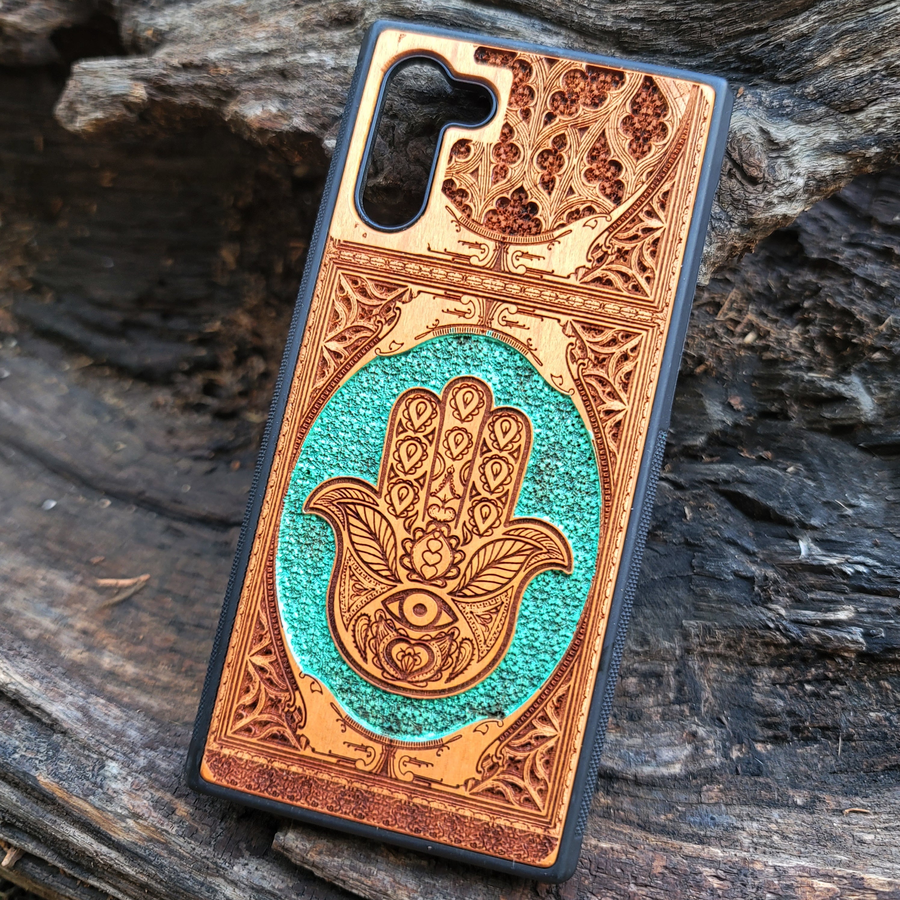 Hand-painted Hamsa Hand symbol wood phone case with Gothic pattern for iPhone & Samsung Galaxy. Laser-engraved design offers durability and style, compatible with iPhone , 15, 14, 13, 12, 11 Pro Max Mini & Samsung Galaxy S, S24, S23, S22, S21, S20 Ultra Plus Note 20.