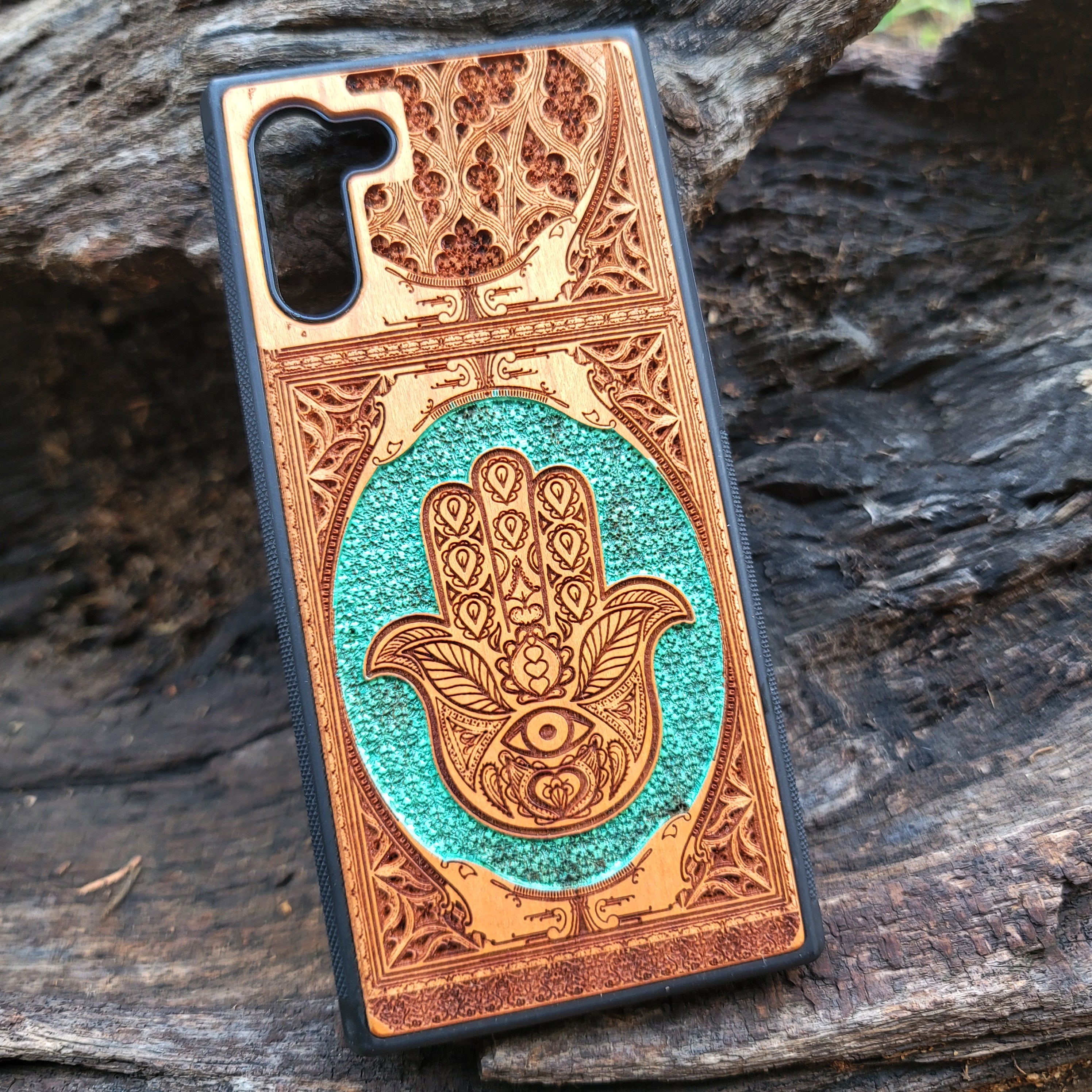 Hand-painted Hamsa Hand symbol wood phone case with Gothic pattern for iPhone & Samsung Galaxy. Laser-engraved design offers durability and style, compatible with iPhone , 15, 14, 13, 12, 11 Pro Max Mini & Samsung Galaxy S, S24, S23, S22, S21, S20 Ultra Plus Note 20.
