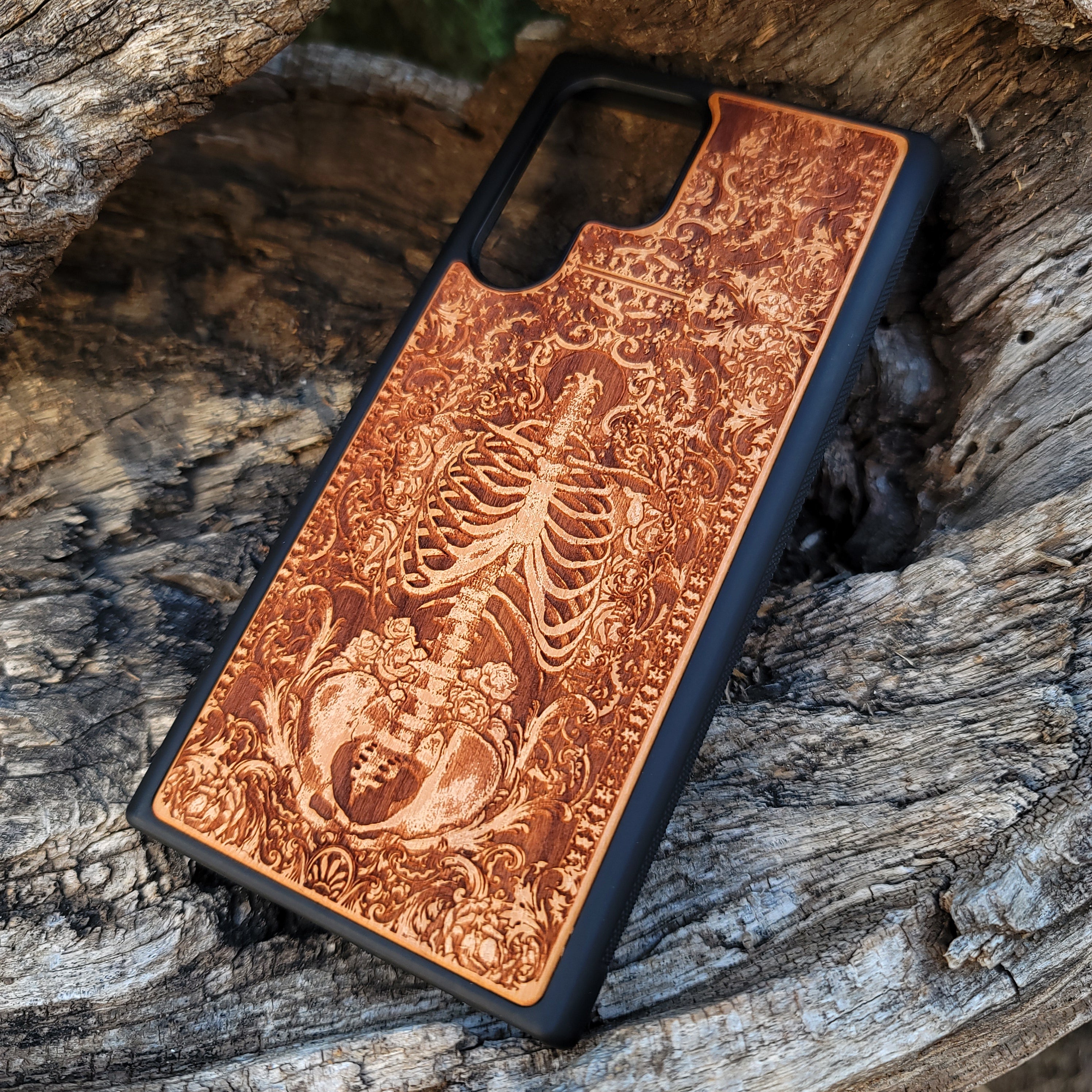 Wooden phone case with a detailed human skeleton torso and roses design, engraved for iPhone , iPhone 15, Galaxy S23 Ultra, Note 20, and more. Perfect for gothic art lovers seeking a unique phone accessory.
