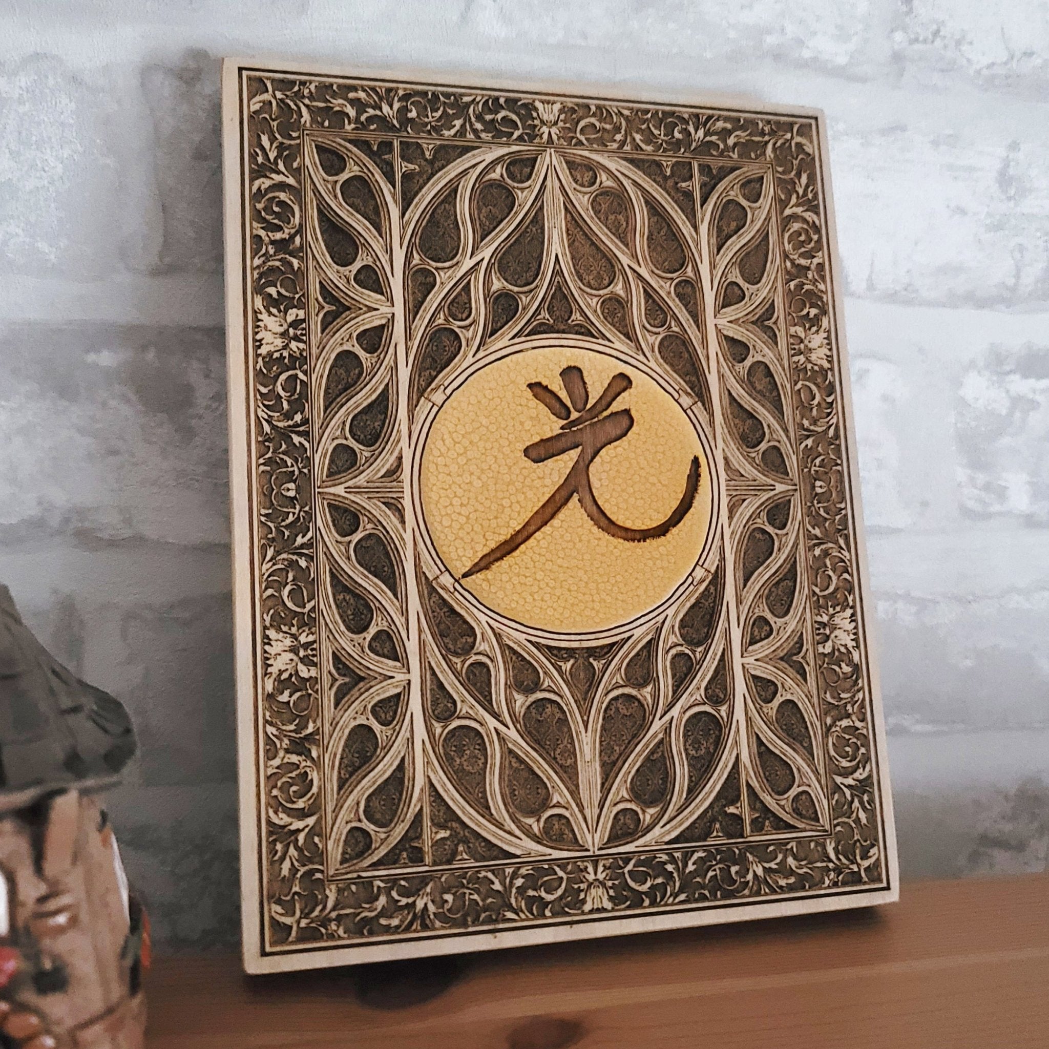 Dark aesthetic gothic wall art with an intricate wood-carved window design.