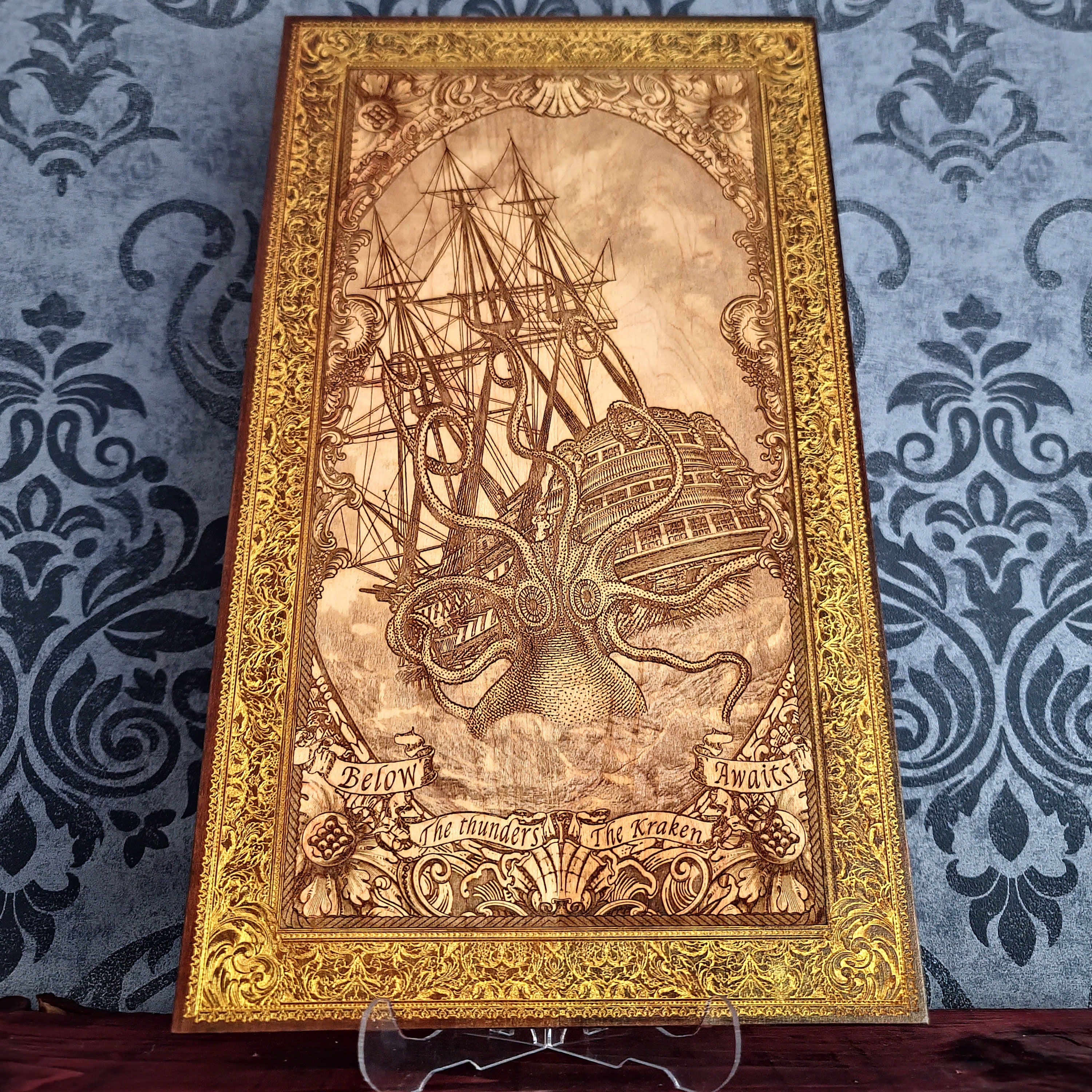 Engraved woodcut wall art of Kraken sea monster attacking sailing boat, nautical maritime décor