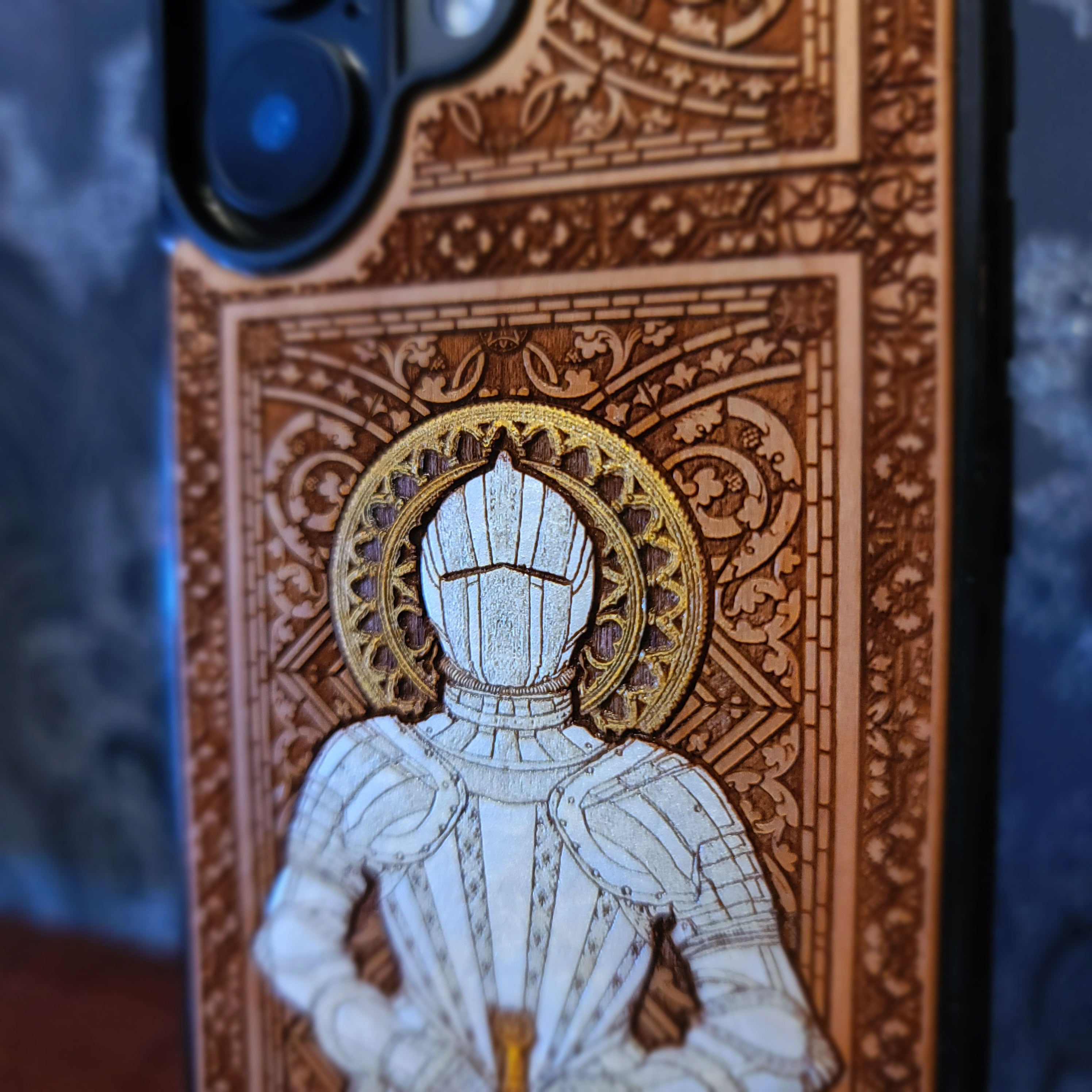 Laser engraved and hand painted wooden phone case featuring a medieval knight in silver armor holding a sword for iPhone and Samsung Galaxy models.