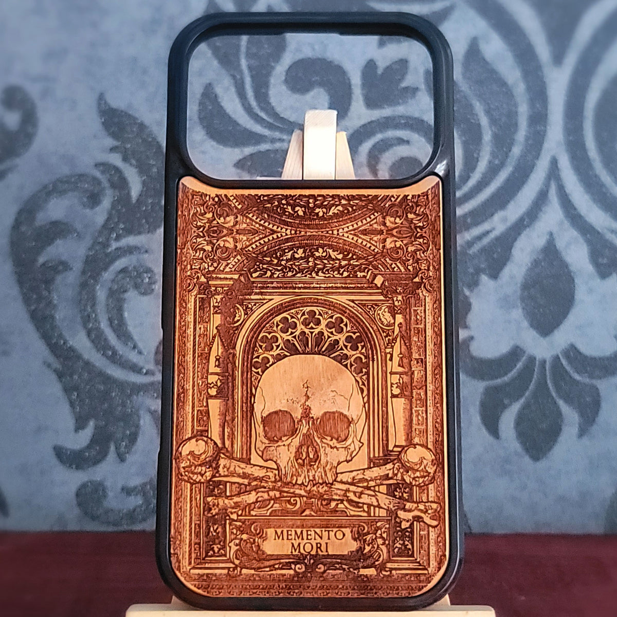 Memento Mori gothic skull engraved wood phone case with crossed bones and ornate architectural design