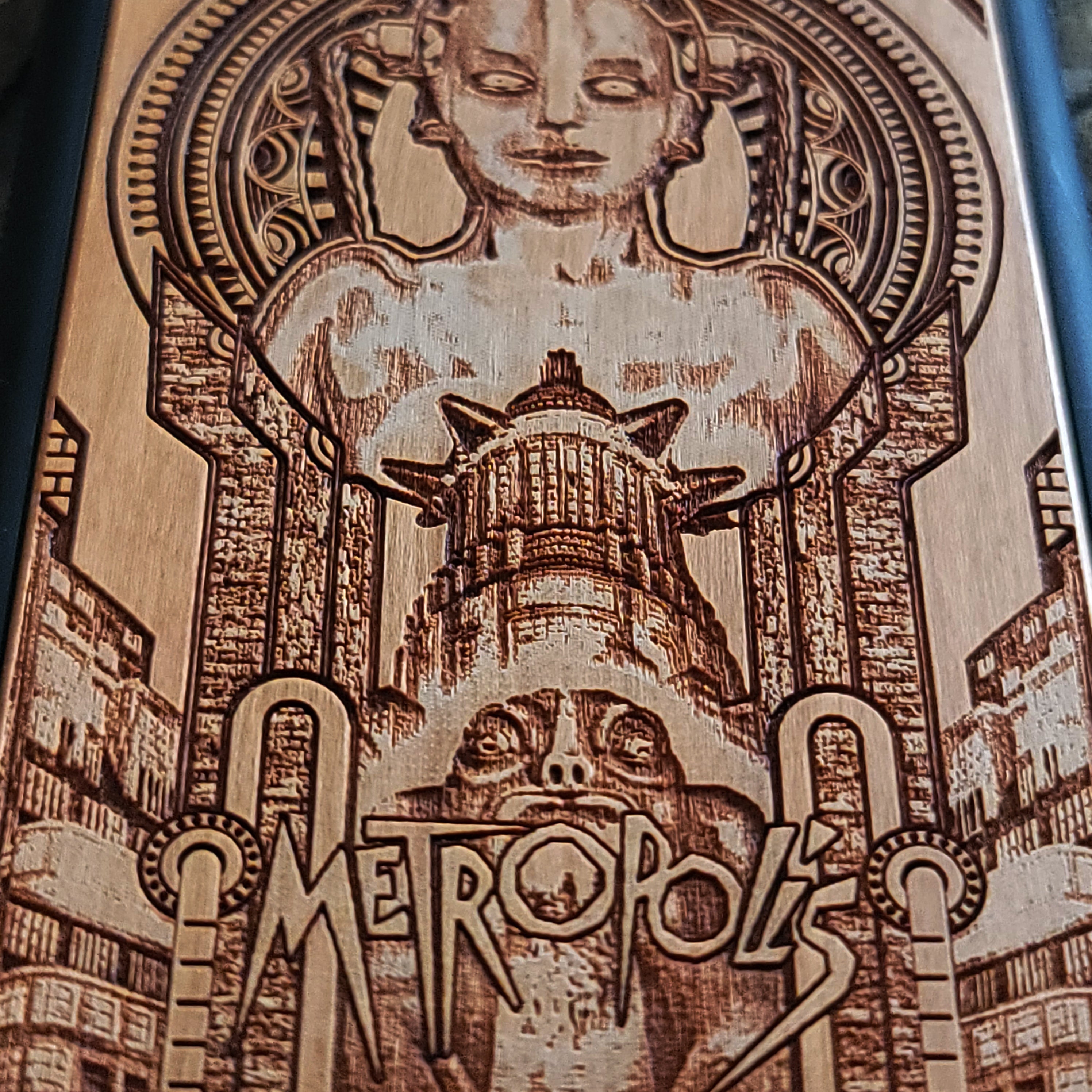 Metropolis wooden phone case with intricate Art Deco design, laser-engraved for iPhone , iPhone 15, Galaxy S, Note 20, and more. A unique accessory for fans of classic films and vintage style.