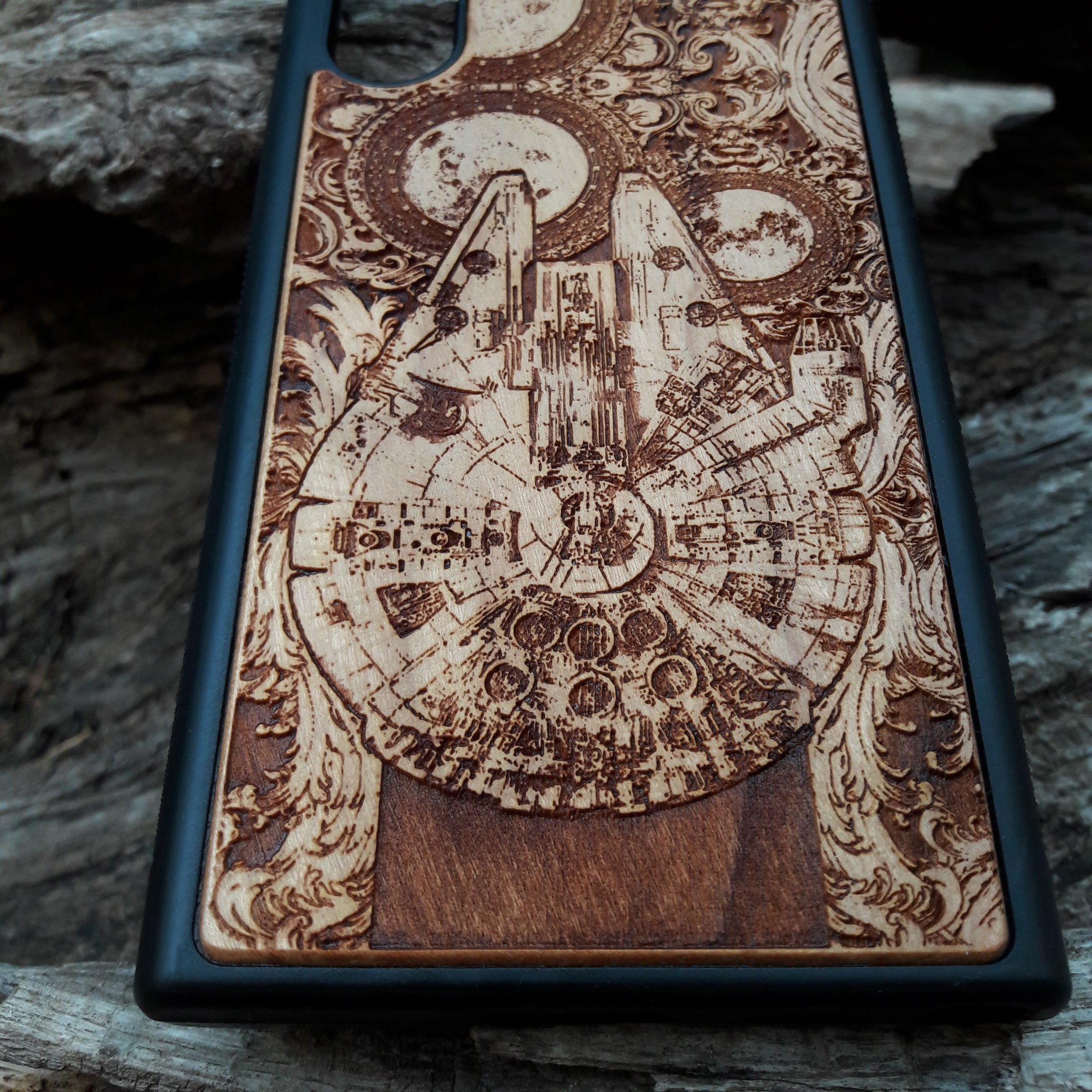 Star Wars wood phone case with Millennium Falcon design, laser-engraved for iPhone , Samsung Galaxy S, and other models, slim and durable.