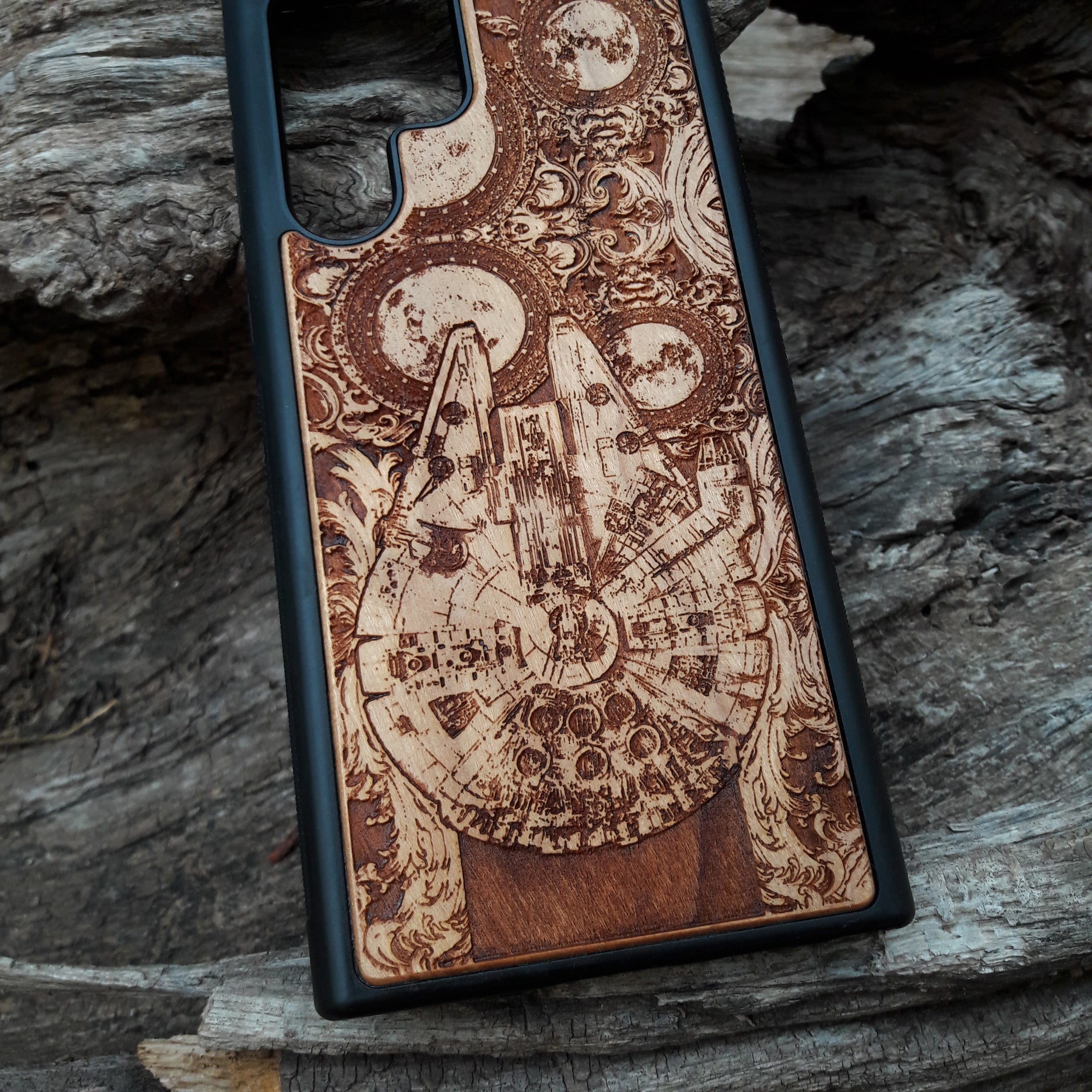 Star Wars wood phone case with Millennium Falcon design, laser-engraved for iPhone , Samsung Galaxy S, and other models, slim and durable.