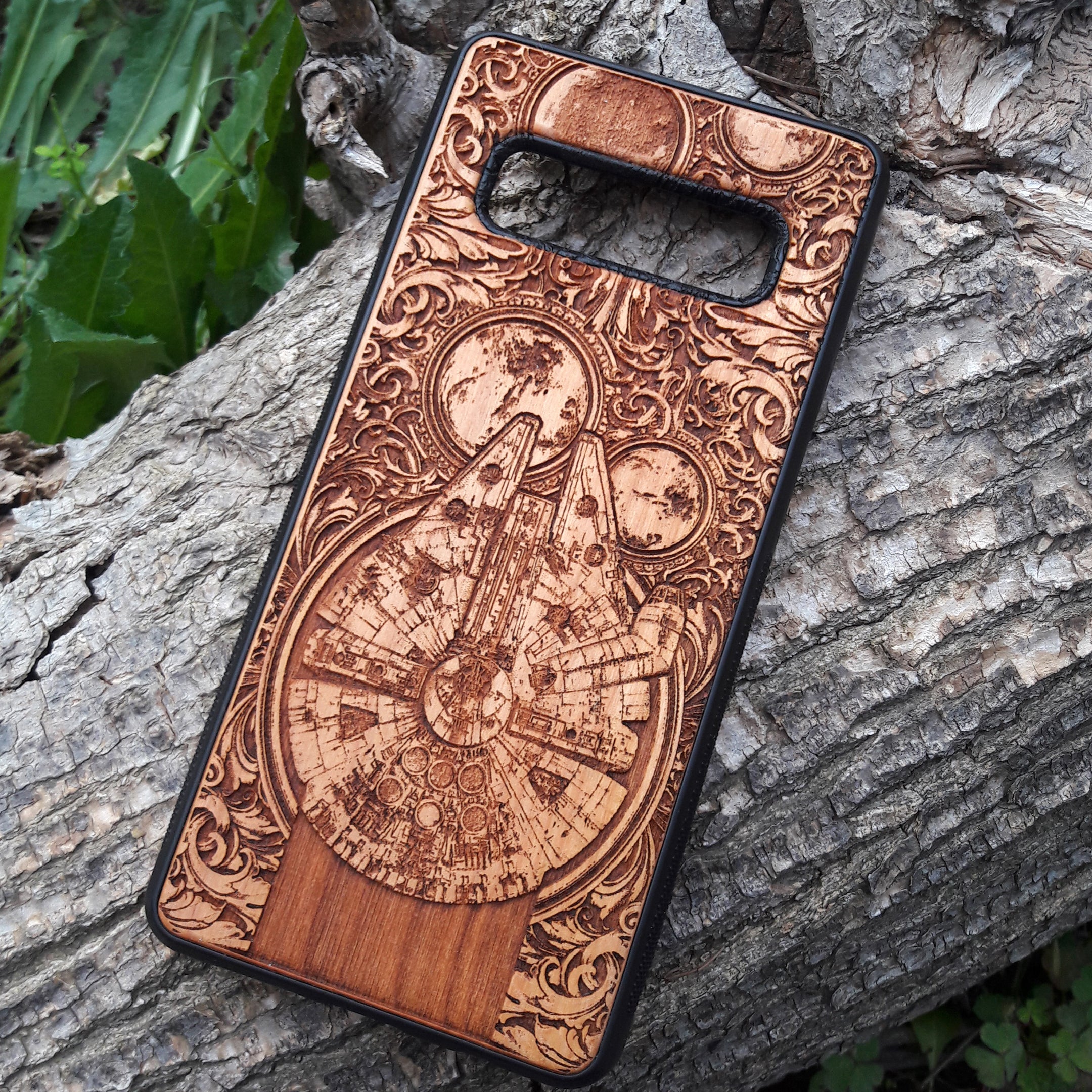 Star Wars wood phone case with Millennium Falcon design, laser-engraved for iPhone  and Samsung Galaxy S, slim and durable.