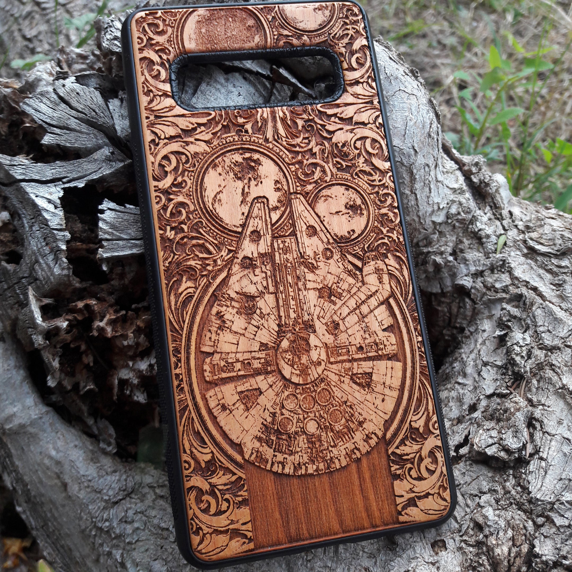Star Wars wood phone case with Millennium Falcon design, laser-engraved for iPhone  and Samsung Galaxy S, slim and durable.