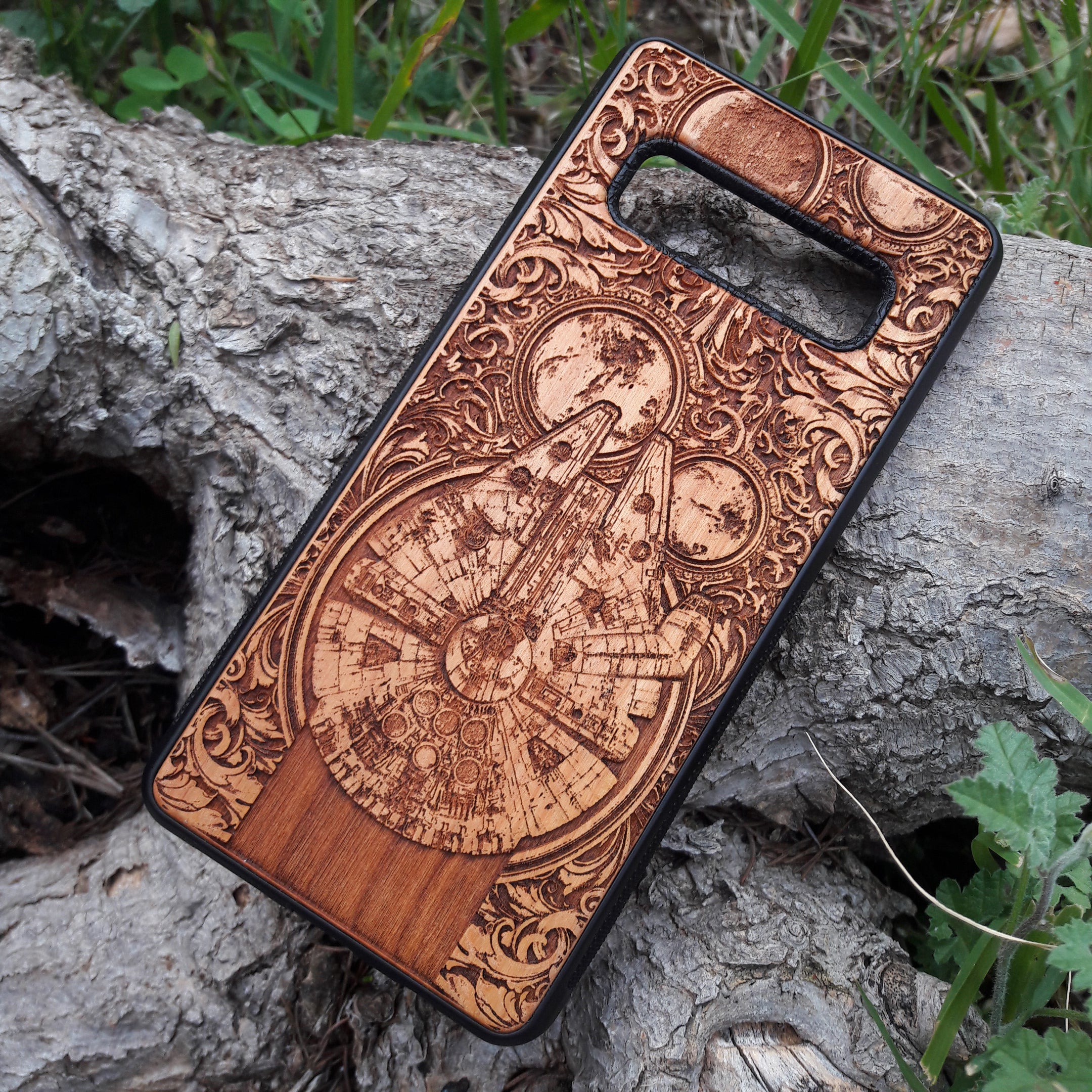 Star Wars wood phone case with Millennium Falcon design, laser-engraved for iPhone  and Samsung Galaxy S, slim and durable.