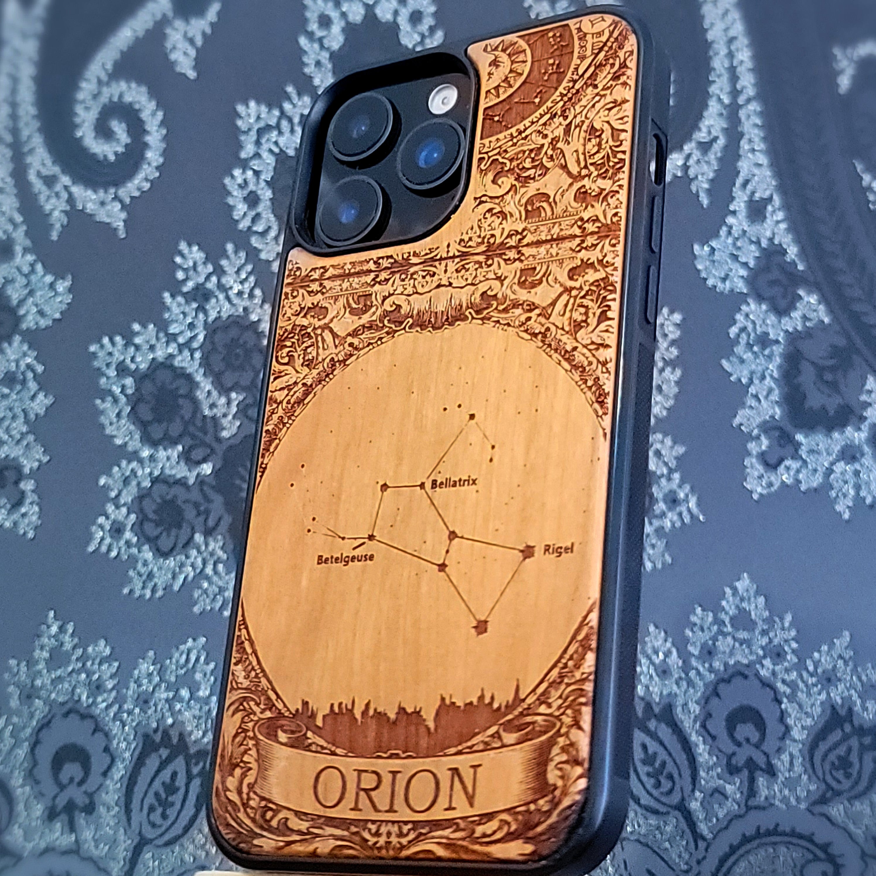laser engraved wooden phone case featuring the Orion constellation with celestial star details on natural wood for iPhone and Samsung Galaxy models.