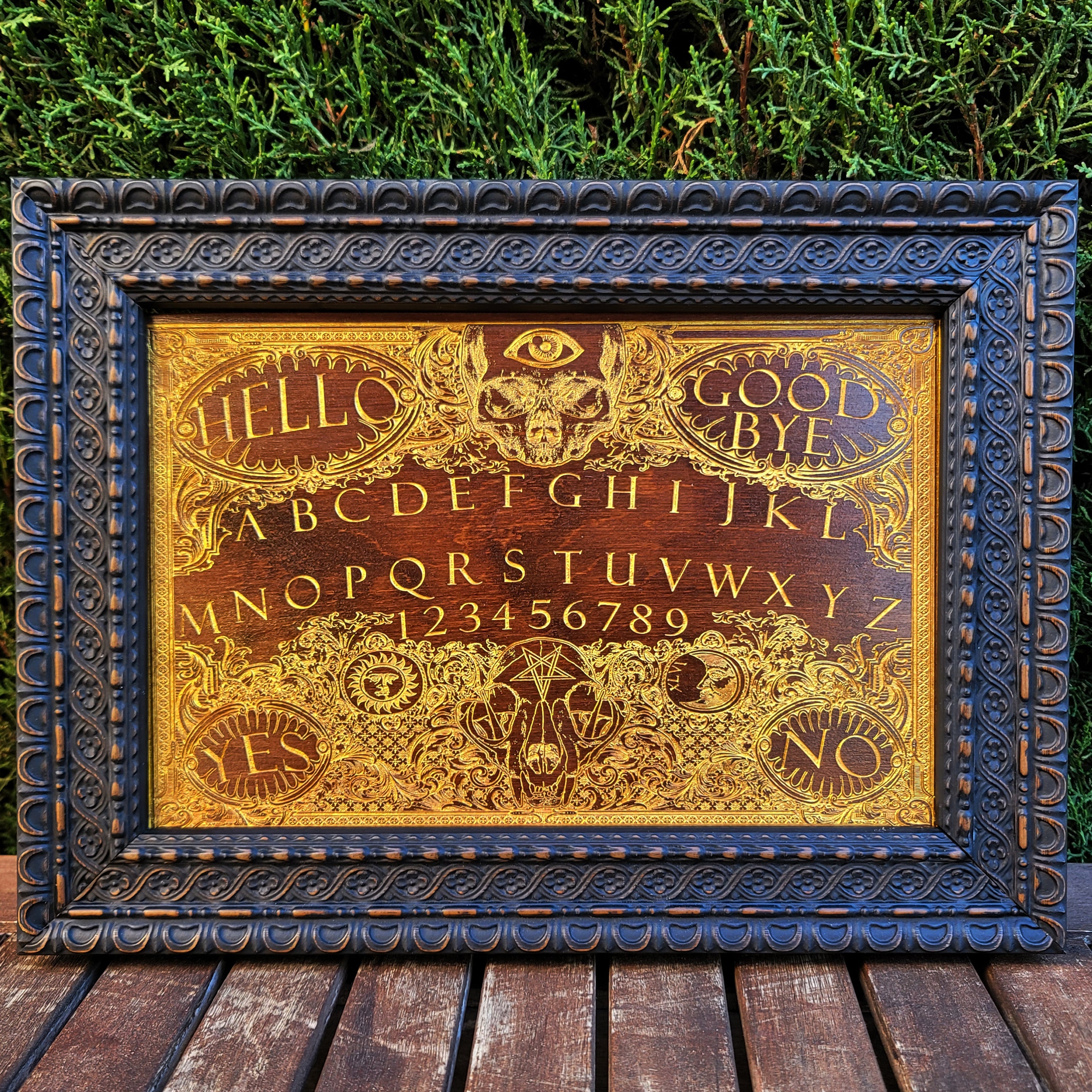 Dark spirit board design in wood, perfect for witchy home or altar wall decor.